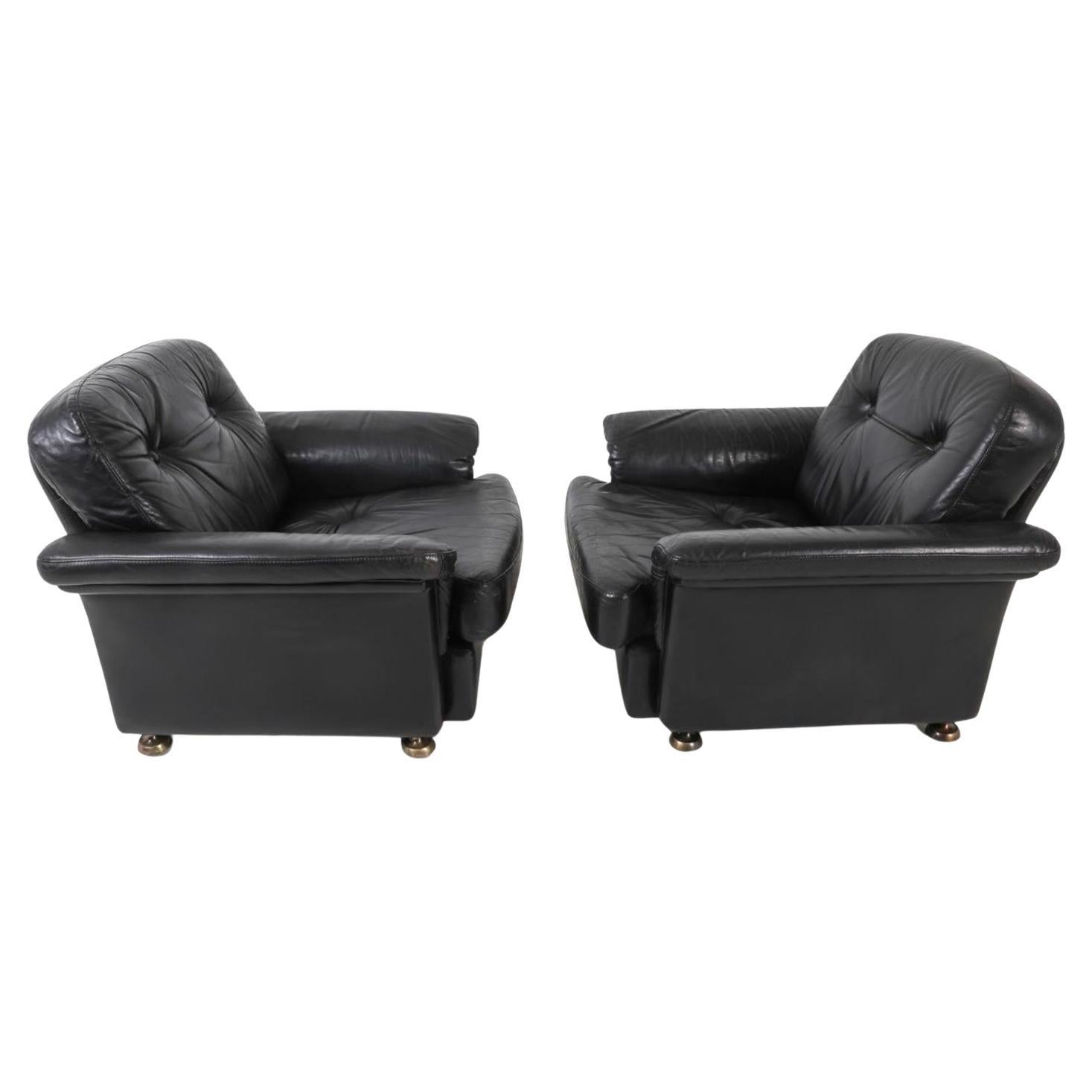 Pair of dutch mid century modern black leather low lounge chairs. Great design with soft black leather curved armrests and tufted cushions. Very clean chairs - Ready for use. In the style of De Sede.

Pick up In Brooklyn NYC or Kingston NY - Message