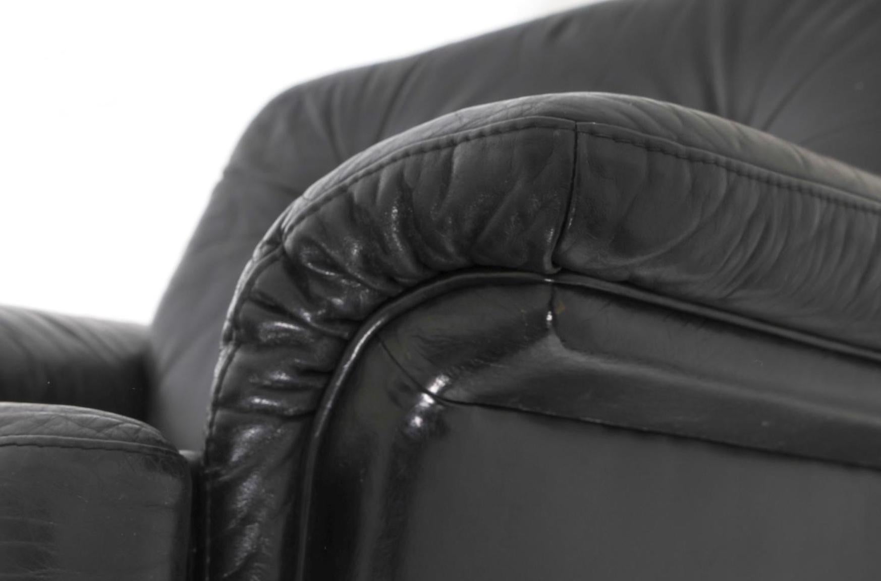 Dutch Pair of dutch mid century modern tufted black leather low lounge chairs For Sale