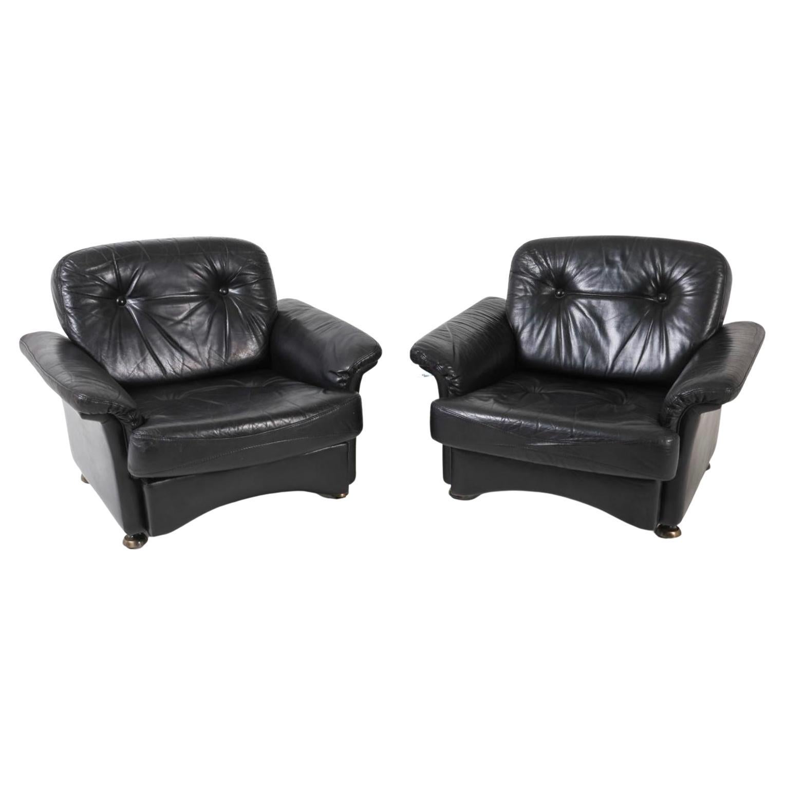Pair of dutch mid century modern tufted black leather low lounge chairs For Sale