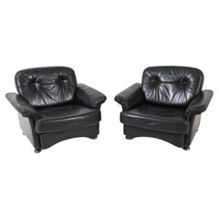 Pair of dutch mid century modern tufted black leather low lounge chairs