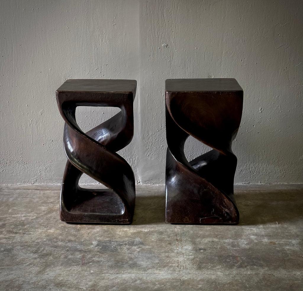 Pair of Dutch midcentury carved wooden stools or side tables. With their precarious asymmetry and soft, organic shape, the pair has a uniquely sculptural sense of movement and harmony.

Netherlands, circa 1960

Dimensions: 17.7 W x 15.7 D x 17.3