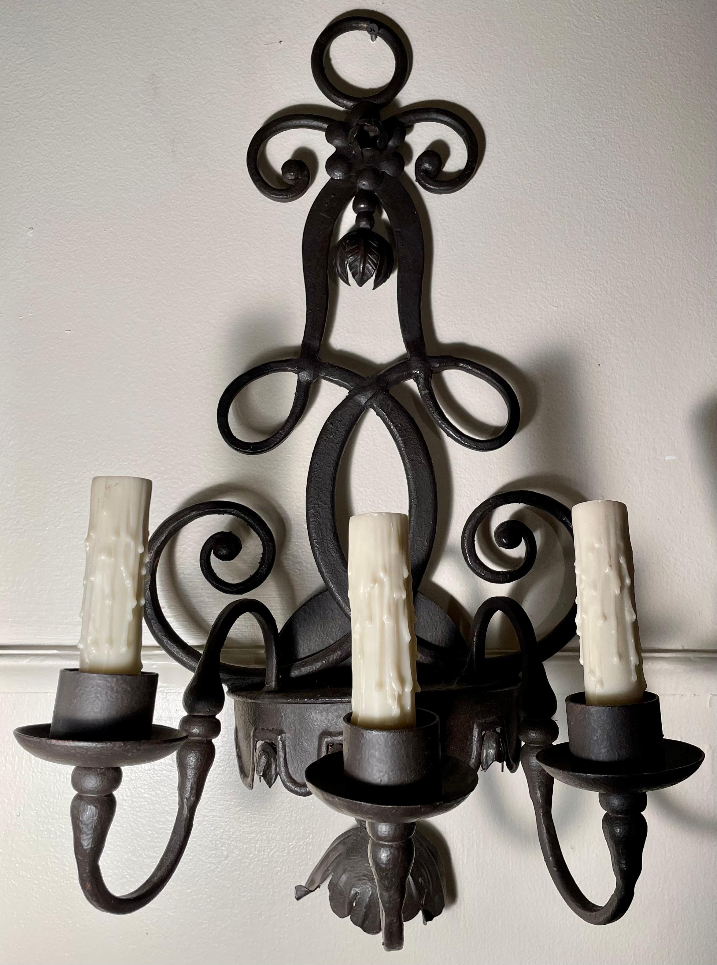 A nice pair of sconces with pleasing lines.