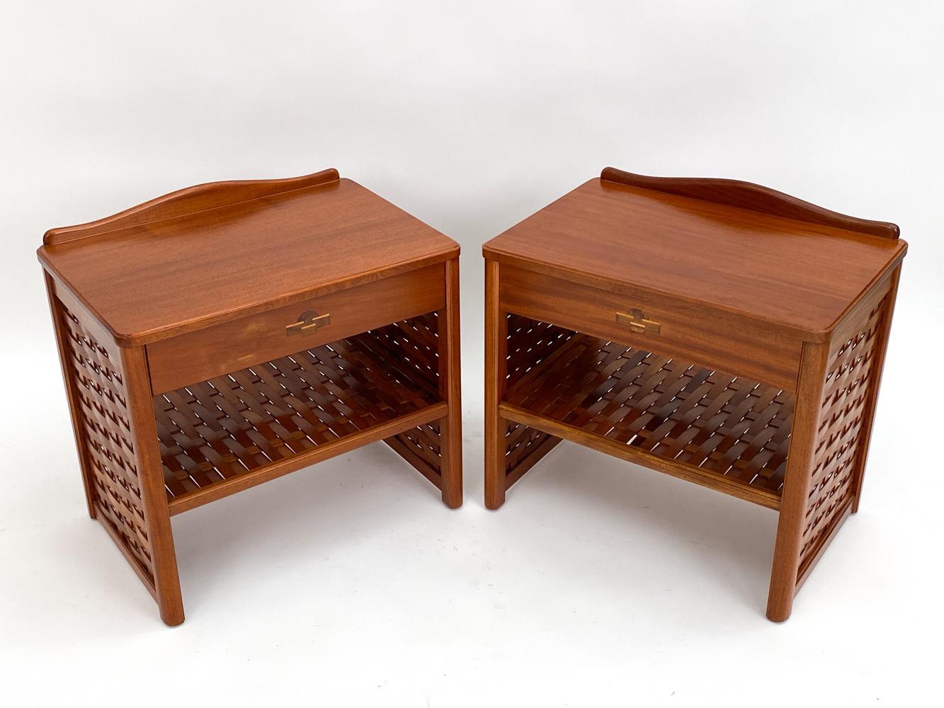 Step into a realm of functional artistry with this pair of exquisite end tables or nightstands by DUX, the renowned maestros of Swedish mid-century design. With every detail meticulously crafted, these tables harmoniously blend the rich allure of