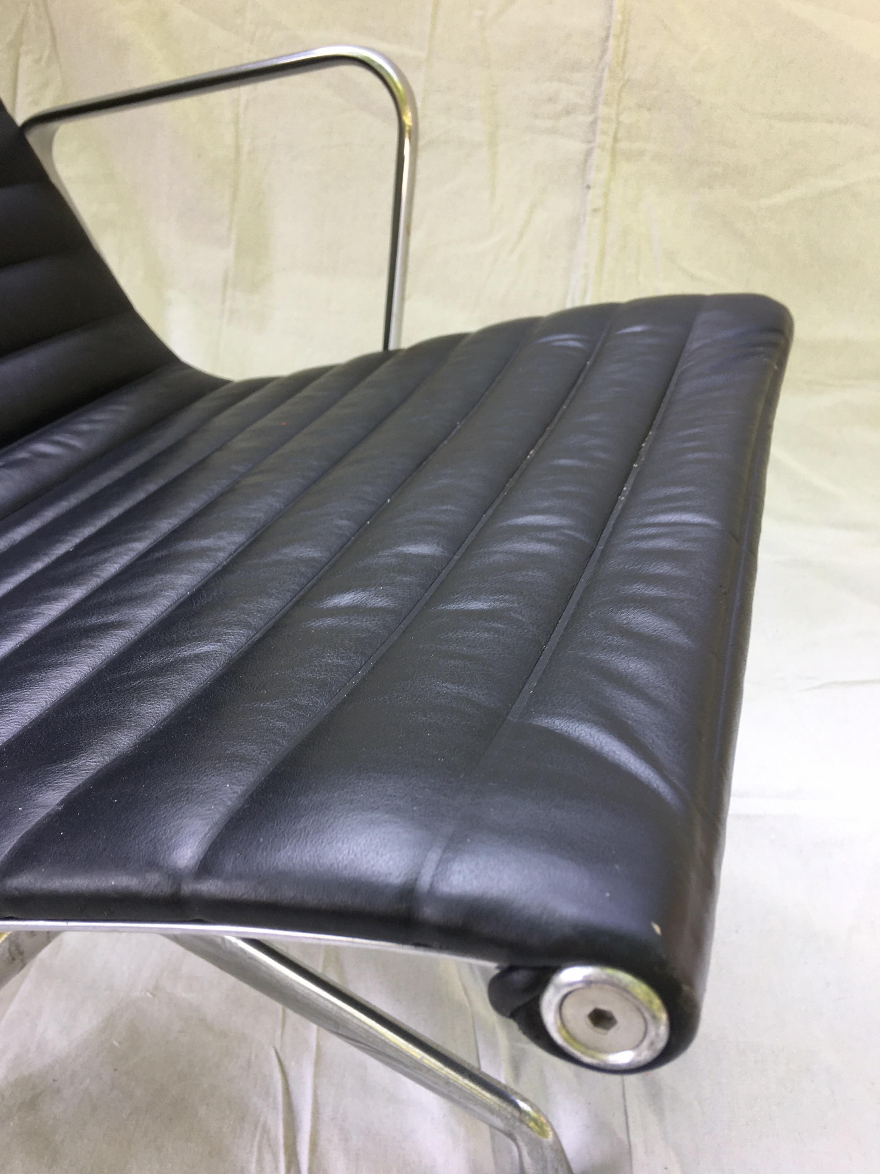 Pair of Eames Aluminum Group Leather Lounge Chairs 5