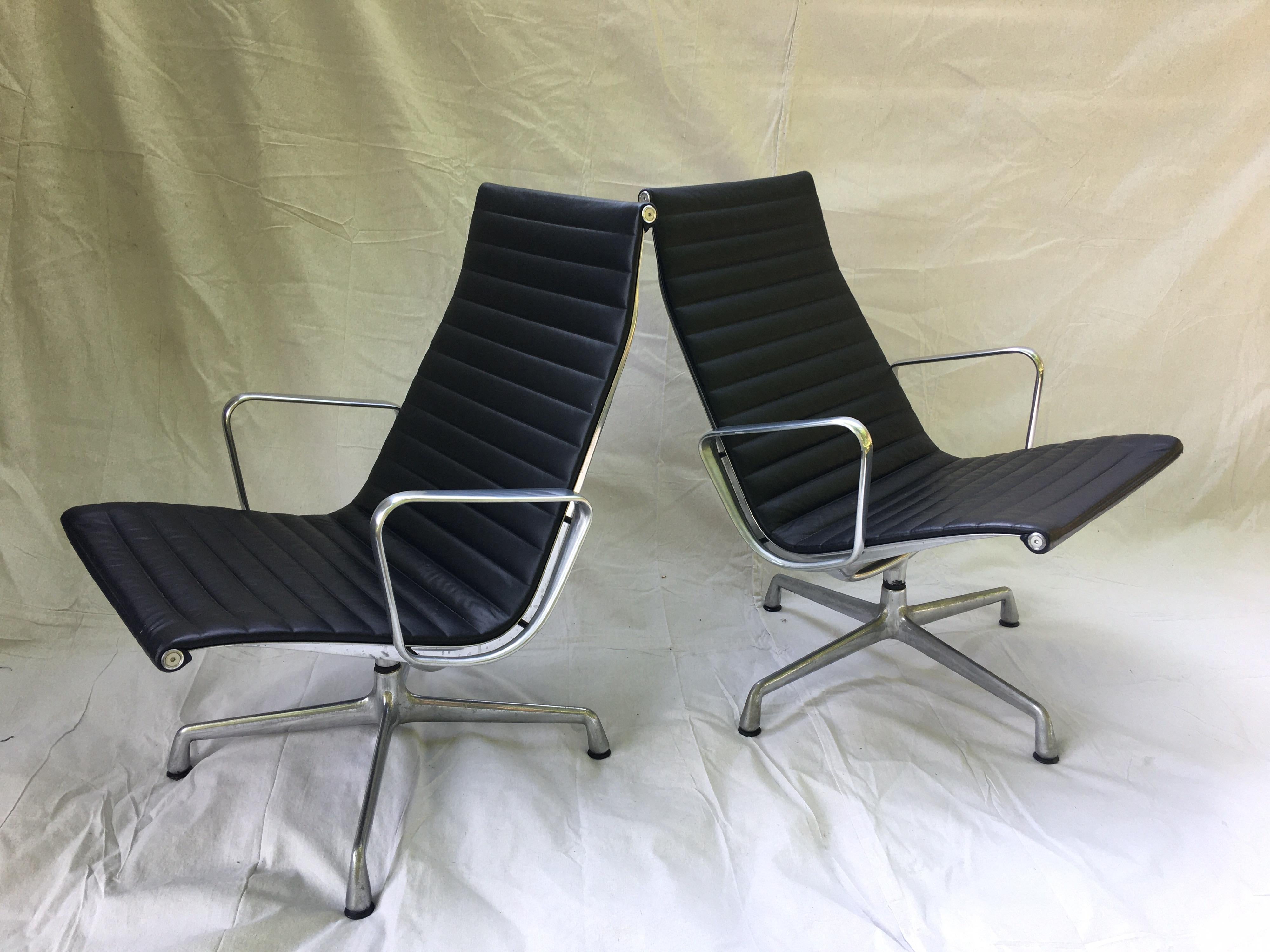 American Pair of Eames Aluminum Group Leather Lounge Chairs