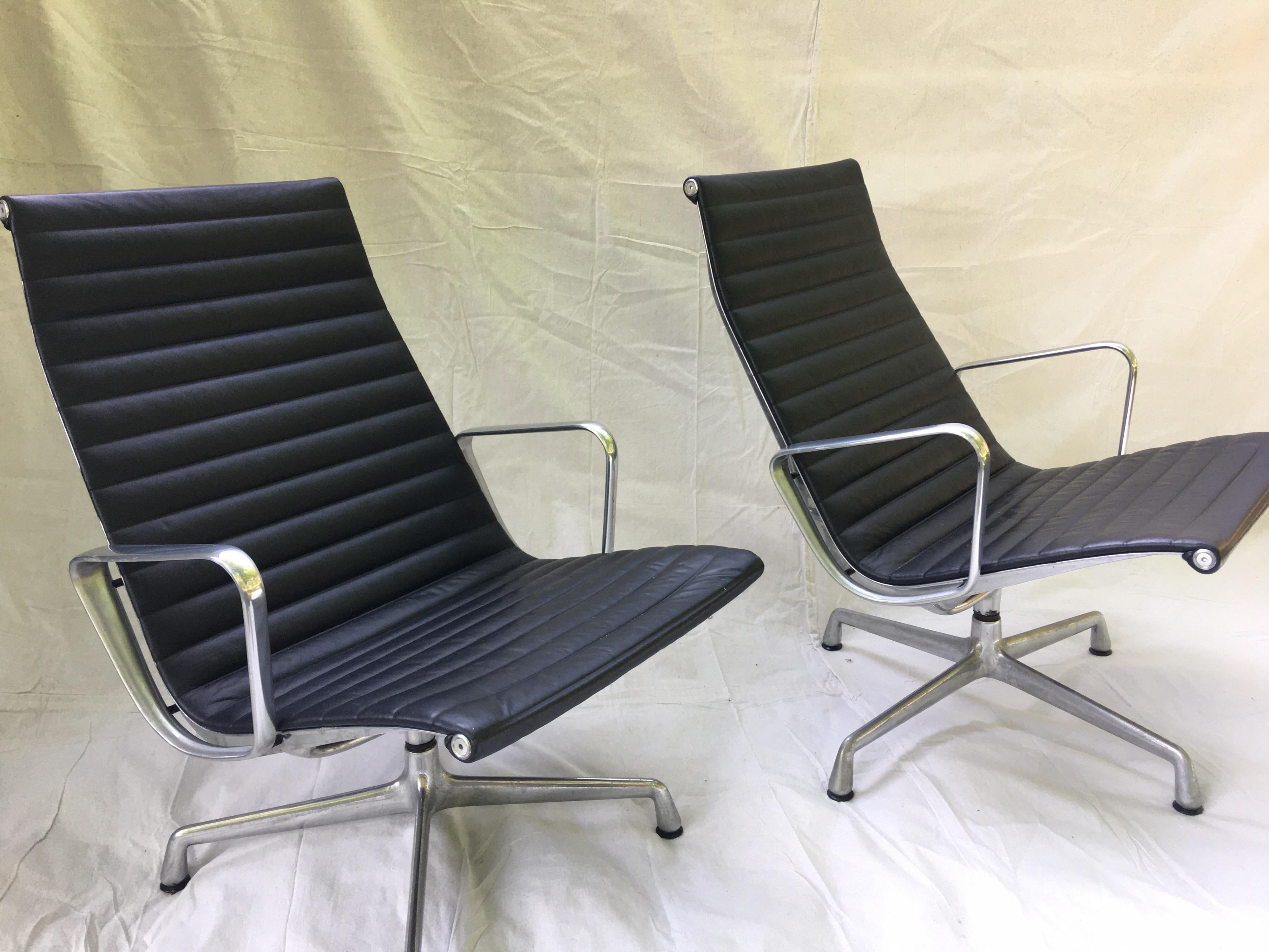 Contemporary Pair of Eames Aluminum Group Leather Lounge Chairs