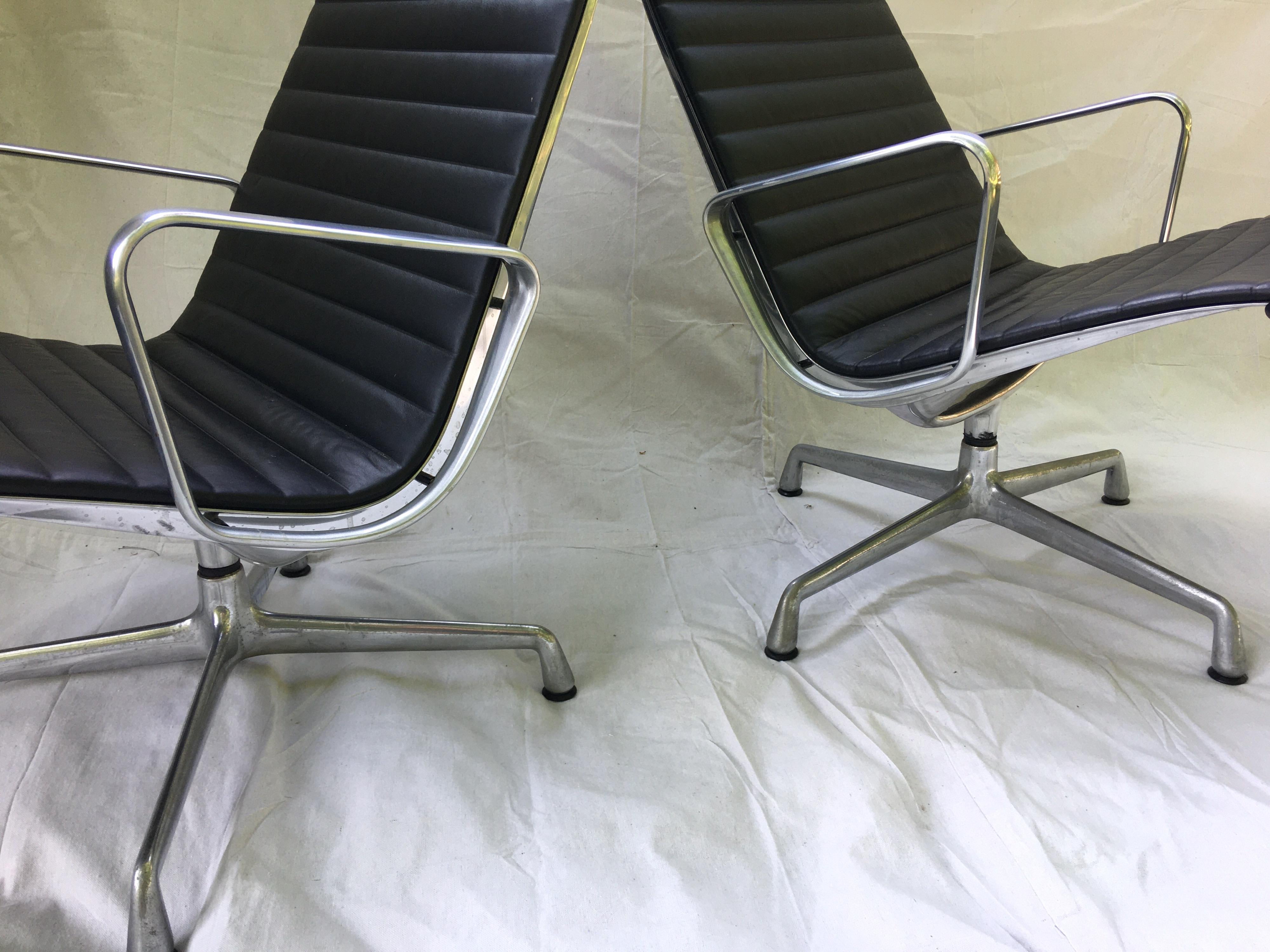 Pair of Eames Aluminum Group Leather Lounge Chairs 1