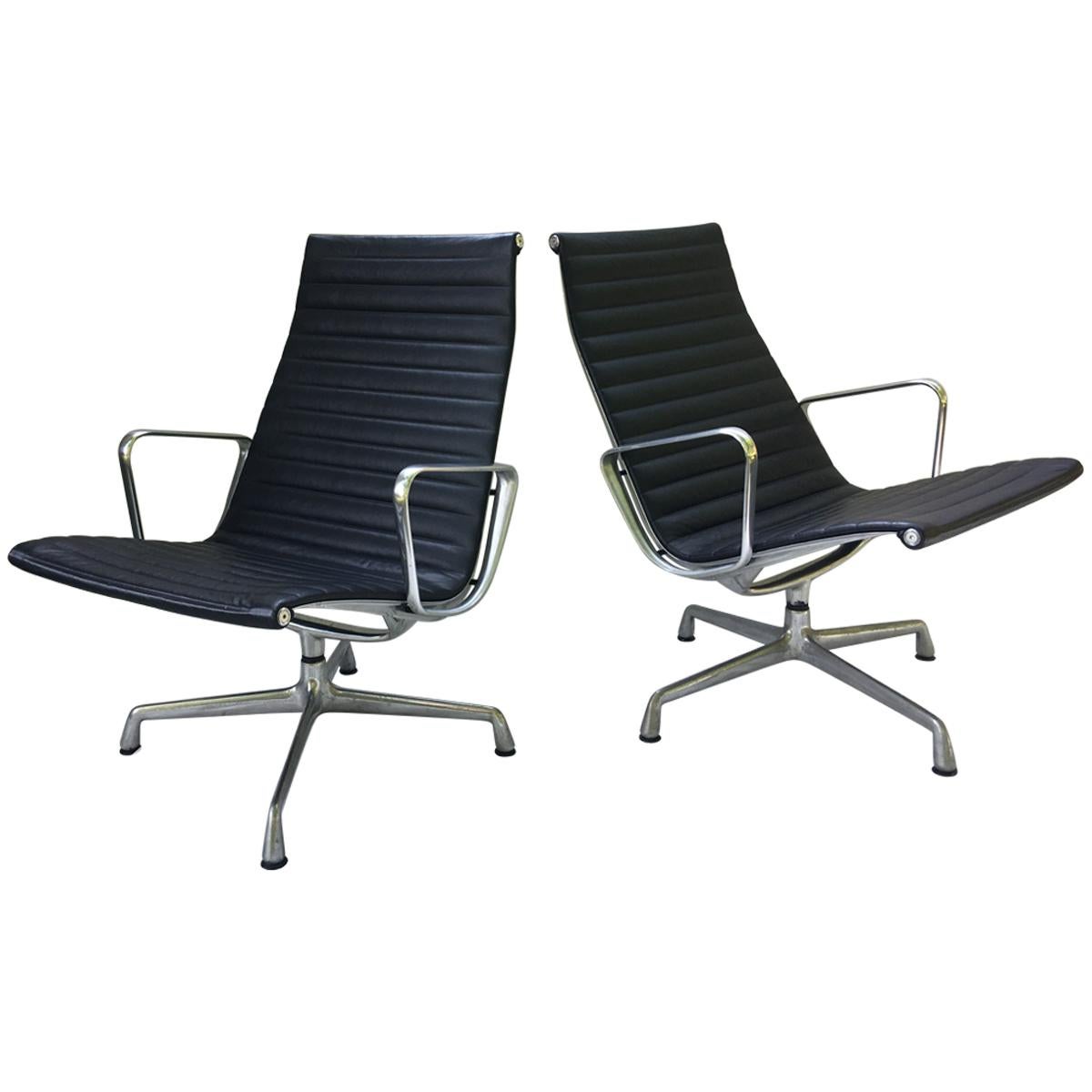 Pair of Eames Aluminum Group Leather Lounge Chairs