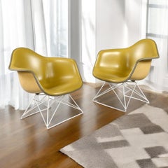 Pair of Eames for Herman Miller LAR Shell Chairs with Yellow Naugahyde Pads