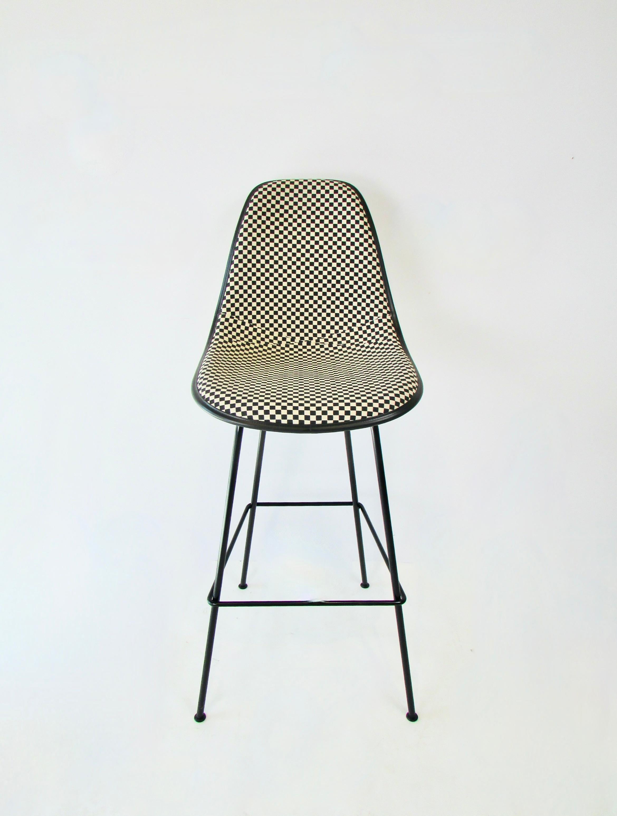 Excellent and basically brand new Eames for Herman Miller barstools. Client bought the set and decided to go in a different direction. I traded them. Never sat in. Wonderful Alexander Girard 
