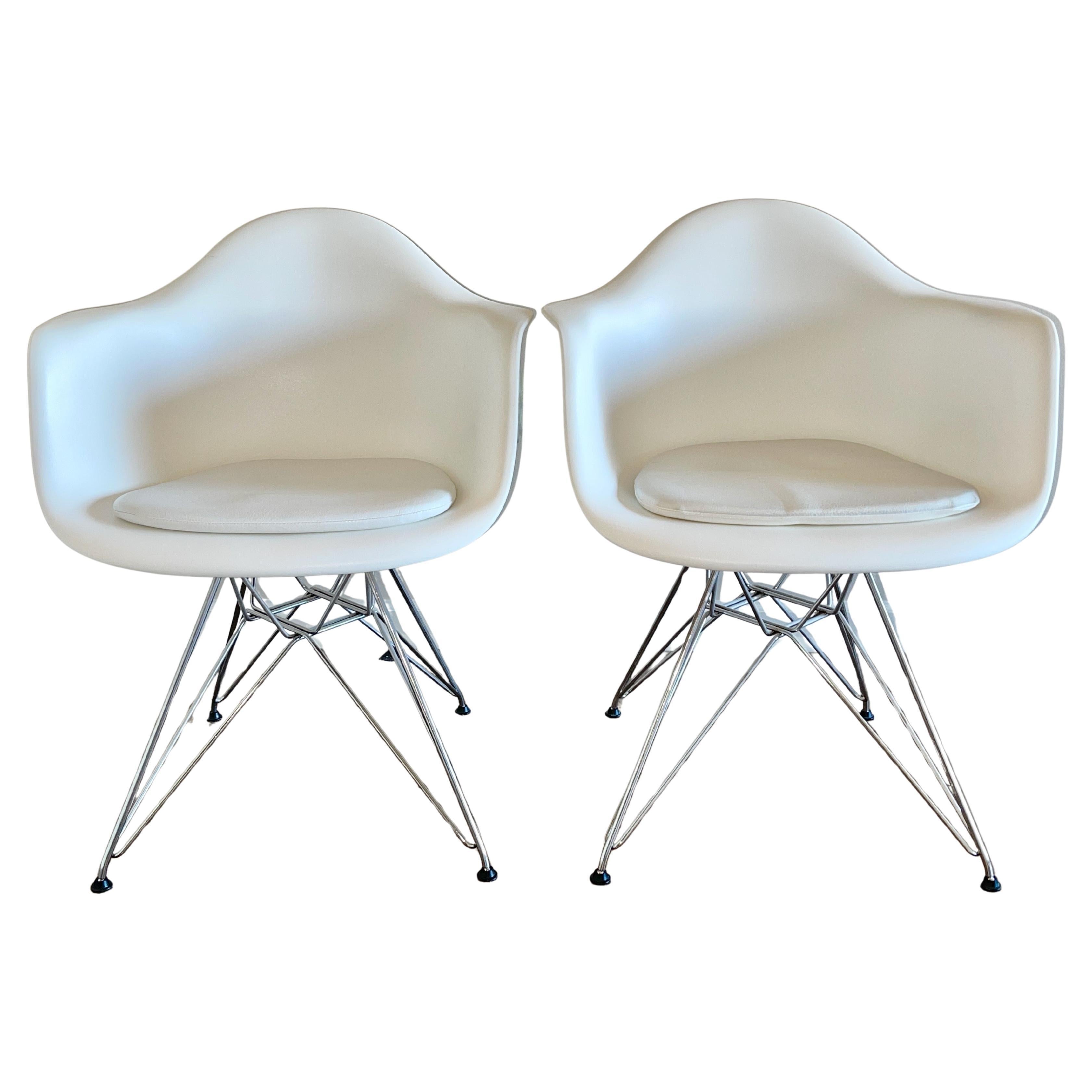 Pair of Eames Molded Plastic Armchairs