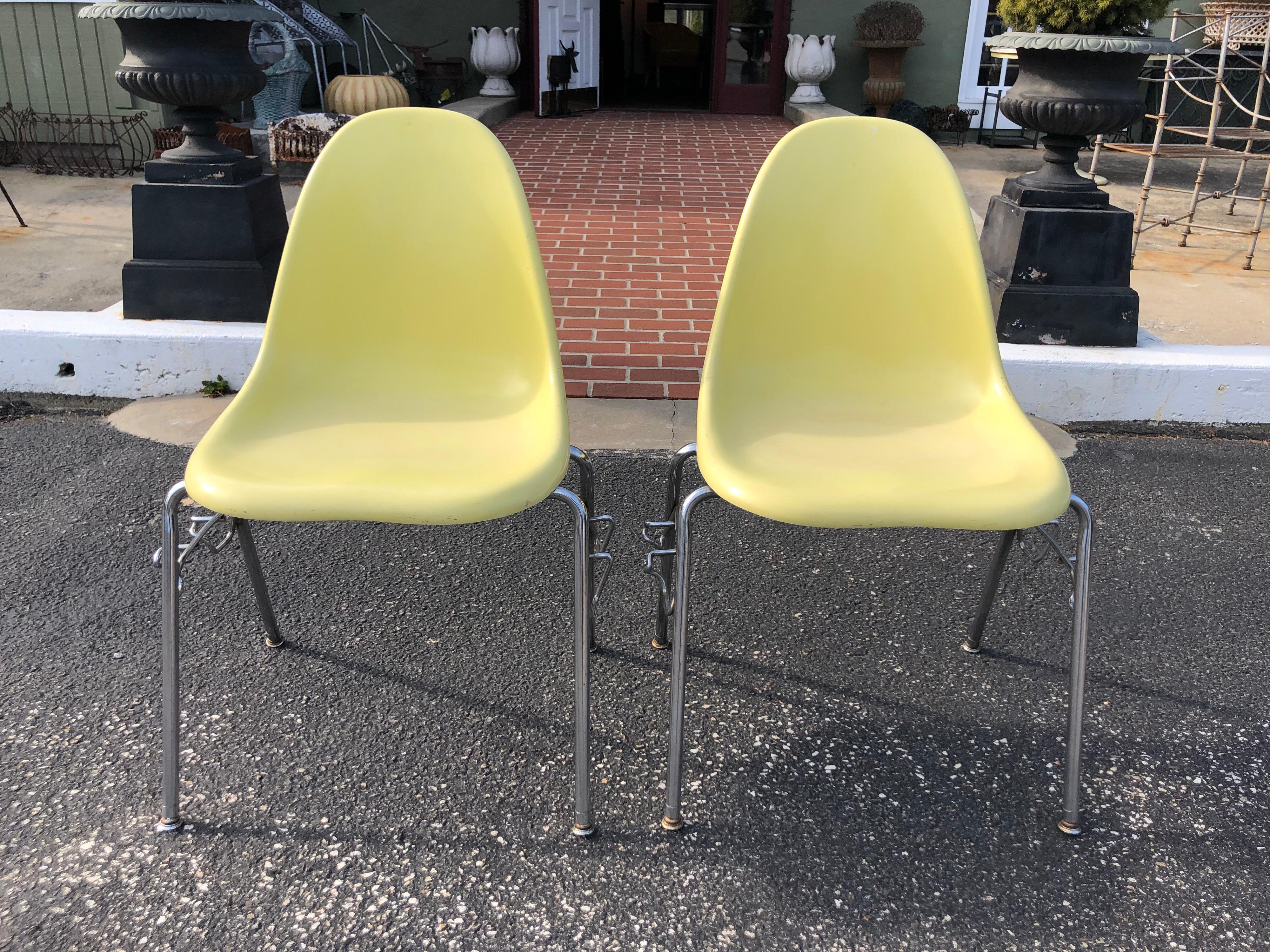 Price is for the pair. Pair of  yellow fiberglass shell chairs by Techfab. (2)
Iconic ,classic design. Sturdy and practical for everyday use. 
These chairs are stackable so perfect for minimal space apartments.  
