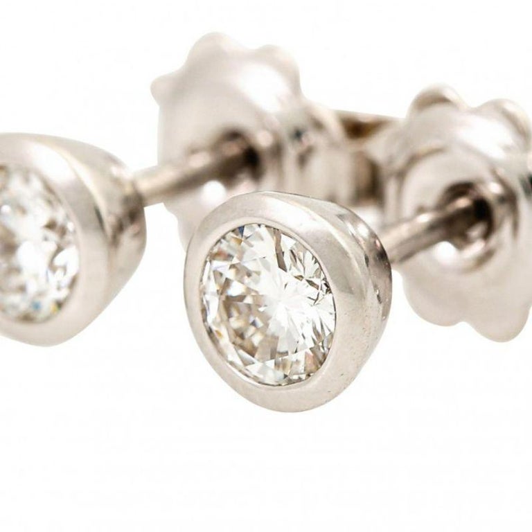 Pair of Ear Studs, with 2 BrilliantCut Diamonds Total 0.57ct For Sale