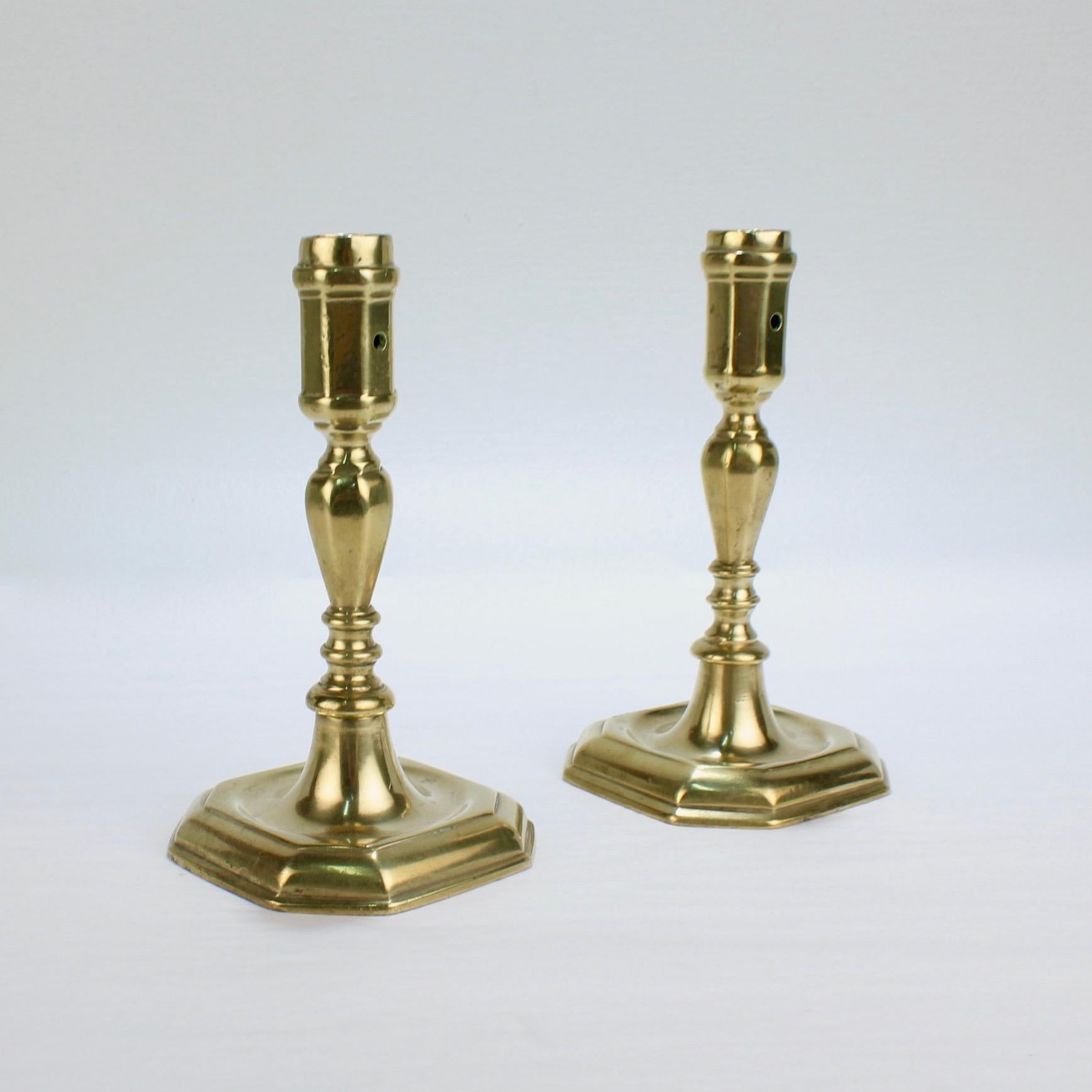 18th Century and Earlier Pair of Early 18th Century French or English Faceted Brass Candlesticks For Sale