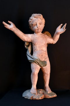 Pair of early 18th century Italian cherubs in polychrome wood