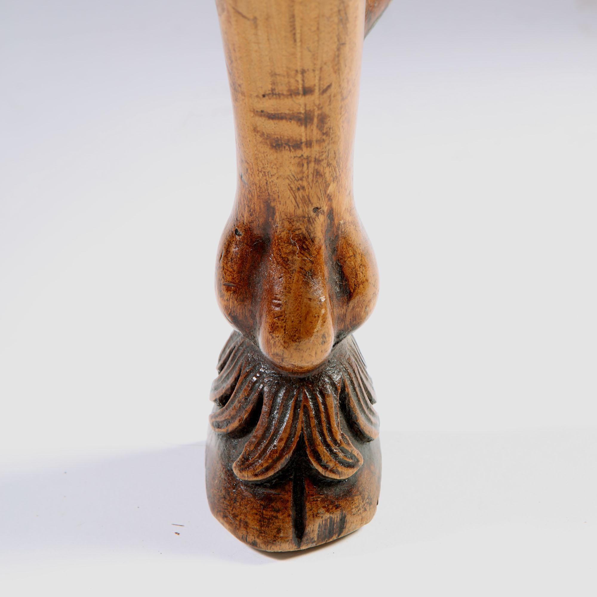 A rare pair of early 18th century walnut stools, the cabriole legs with carved scrollwork knees, and terminating in hoof feet, the legs joined by X-stretchers with a central vase detail. Throughout retaining a wonderful rich patina.
Italy, circa