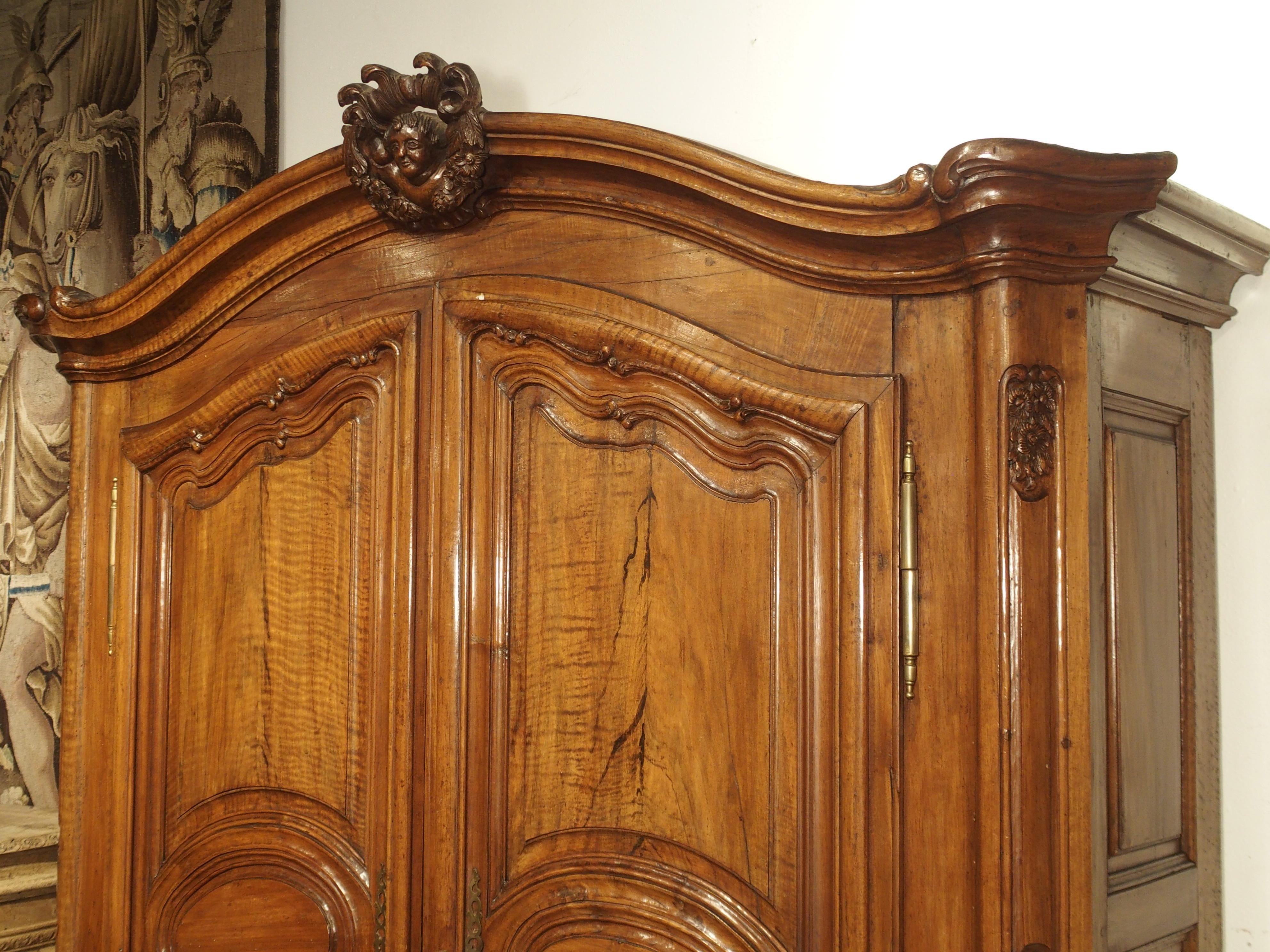 Pair of Early 18th Century Walnut and Olive Wood Armoires from Eastern France 1