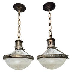 Used Pair of Early 1900s French Arts & Crafts Holophane Brass & Glass Pendant Lights