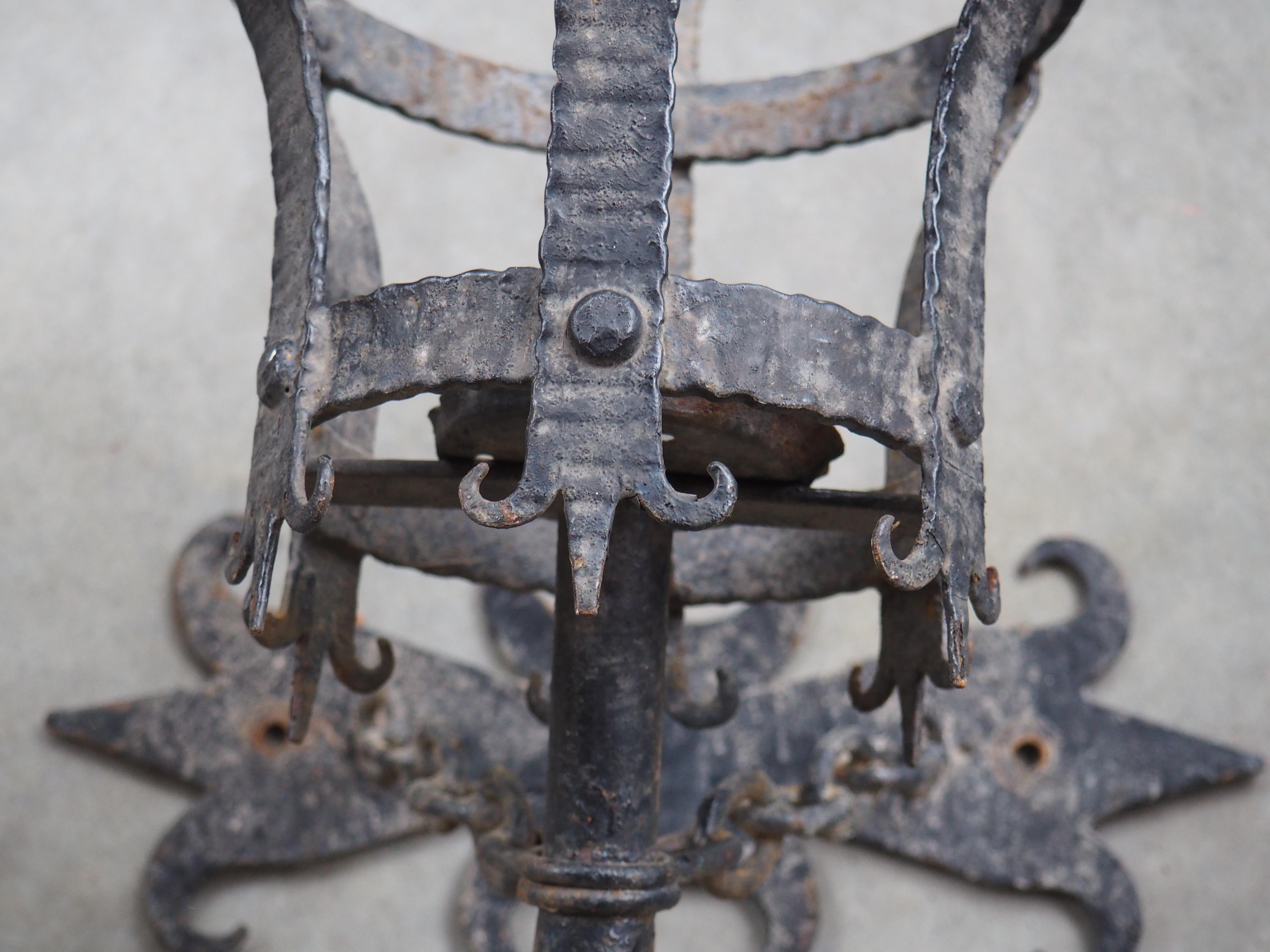 Hand-Painted Pair of Early 1900s French Medieval Style Wrought Iron Torch Sconces For Sale