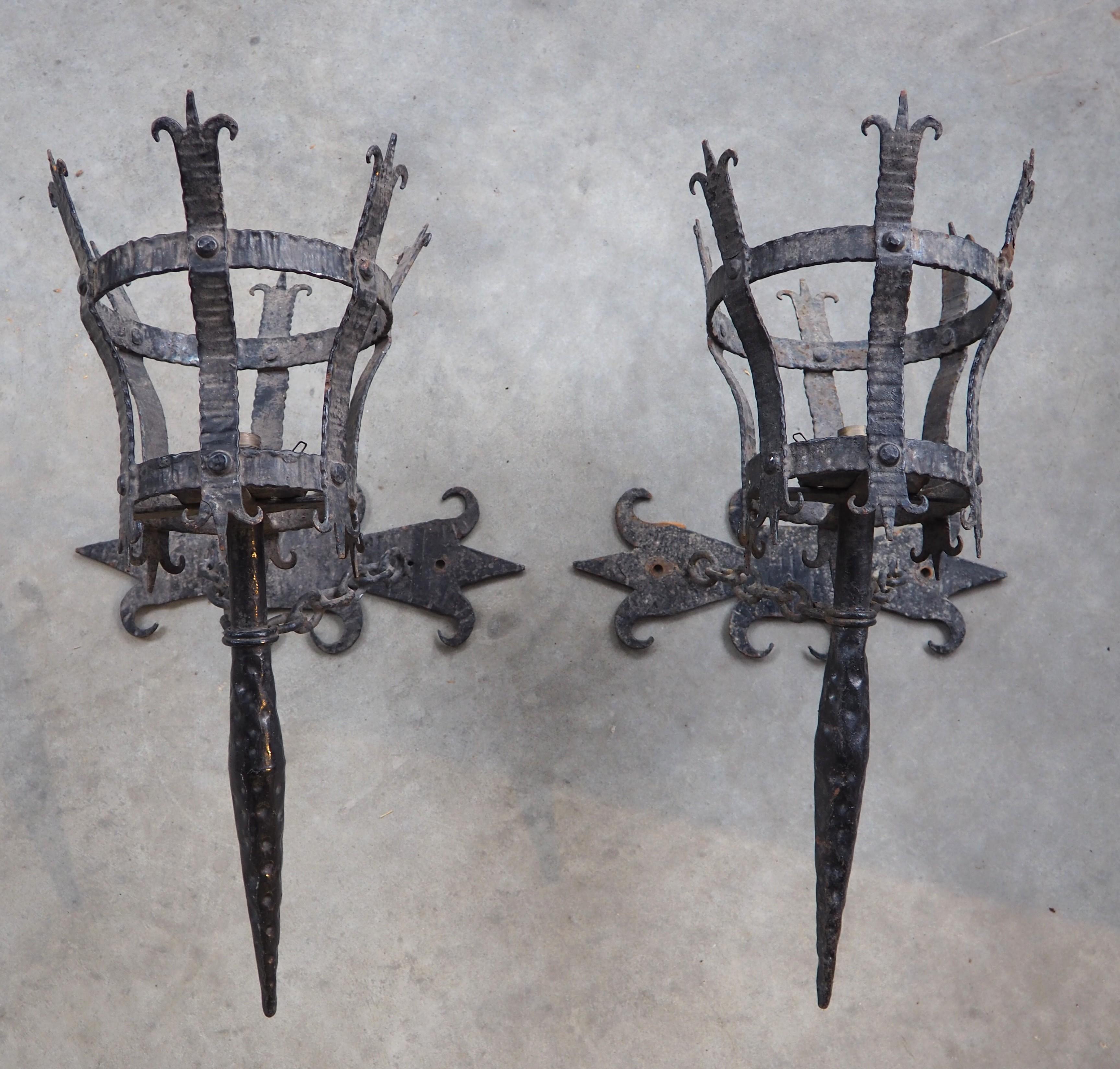 20th Century Pair of Early 1900s French Medieval Style Wrought Iron Torch Sconces For Sale