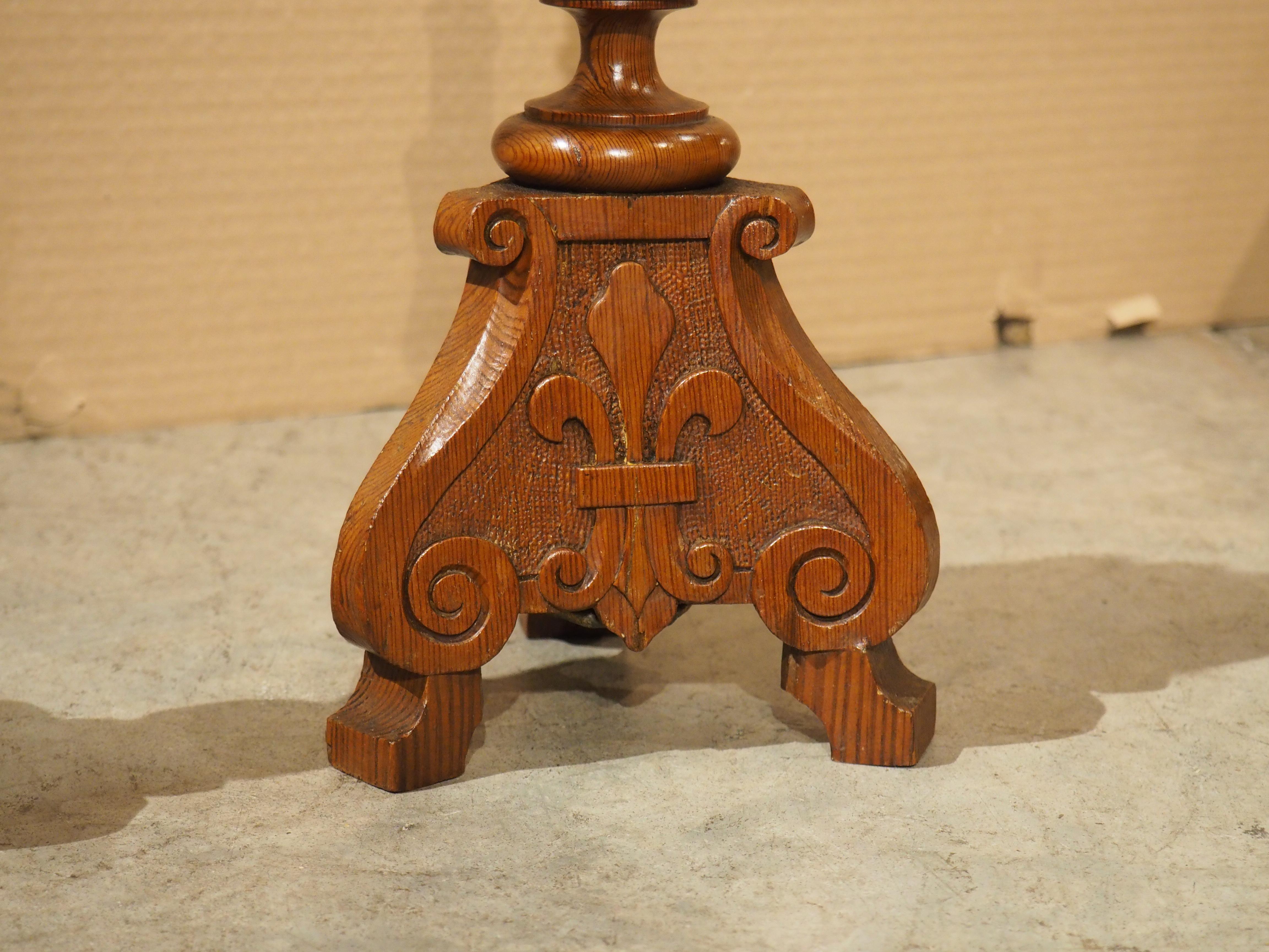 Pair of Early 1900's French Pine Candlesticks with Fleur De Lys Relief Carvings In Good Condition For Sale In Dallas, TX