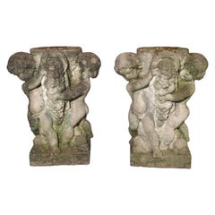 Pair of Early 1900s Reconstituted Stone Putti Planters from Belgium