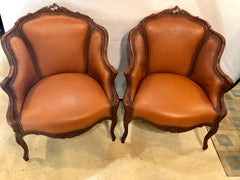Pair of Early 1920s Louis XV Style Barrel Back Bergere Armchairs