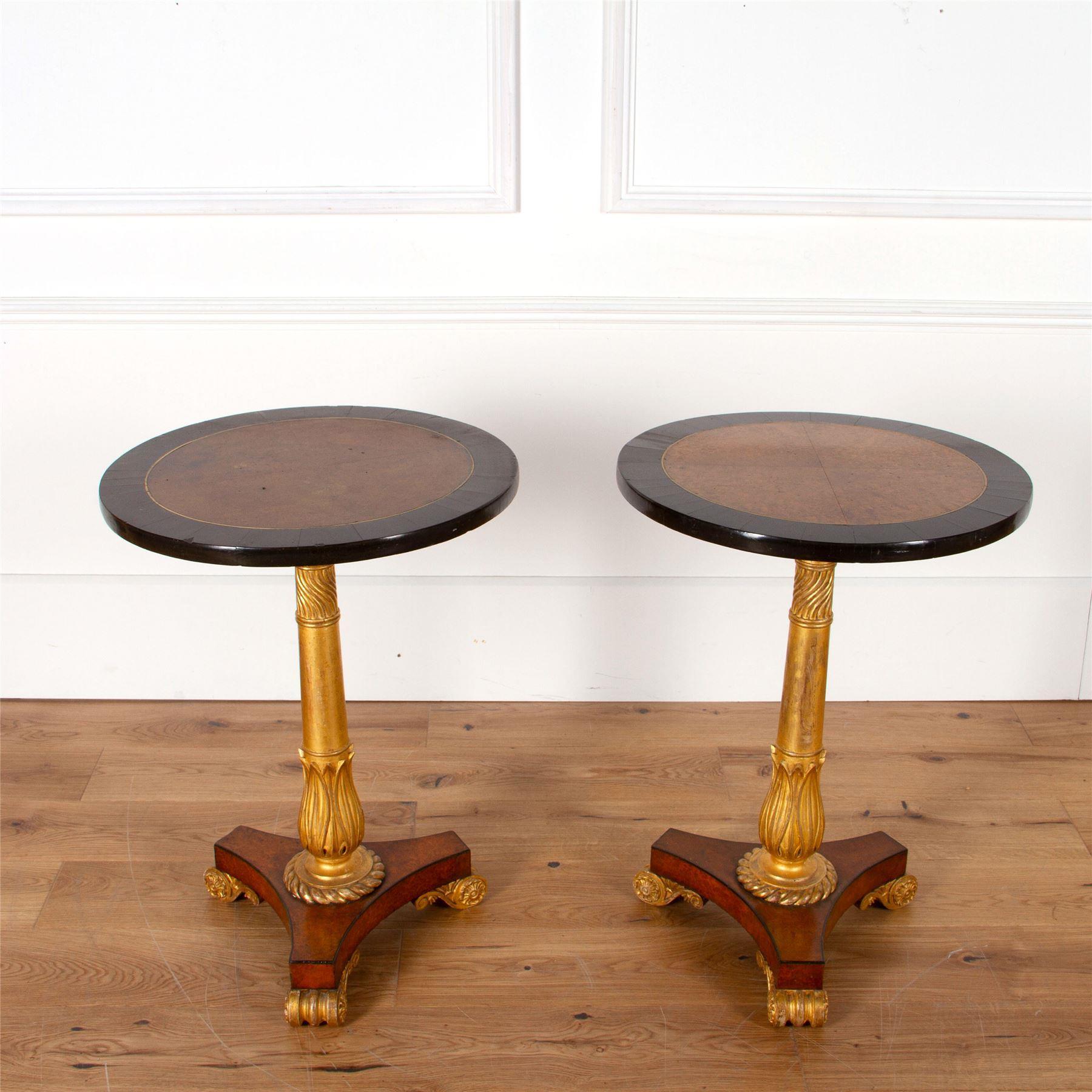 A rare pair of early English 19th century Amboyna ebony and parcel gilt side tables of superb quality.