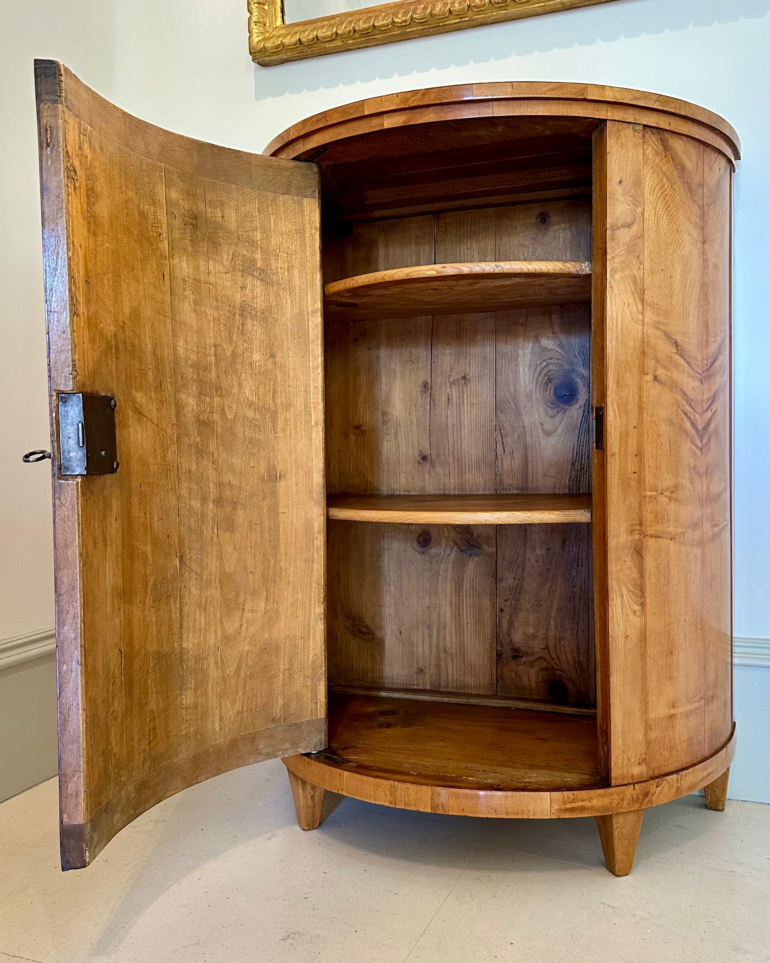 Pair of early 19th Century Biedermeier Maple Demi-lune Side Cabinets. 1