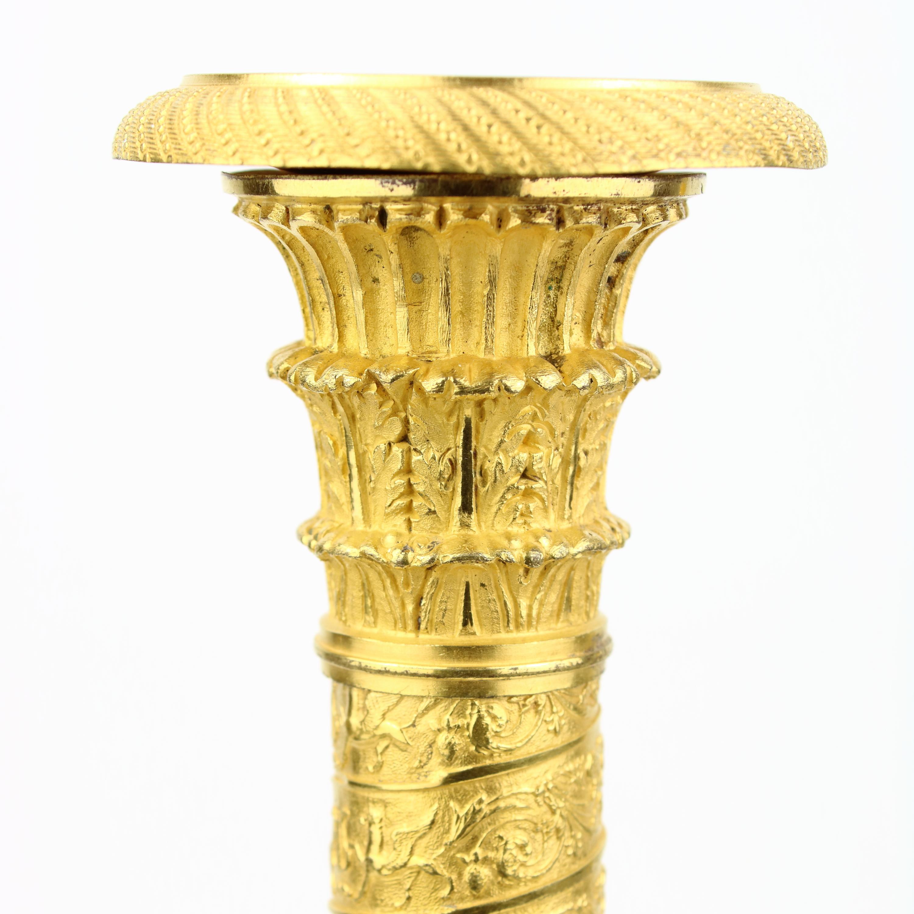 Pair of Early 19th Century Empire Trajan's Column Ormolu Candlesticks For Sale 1