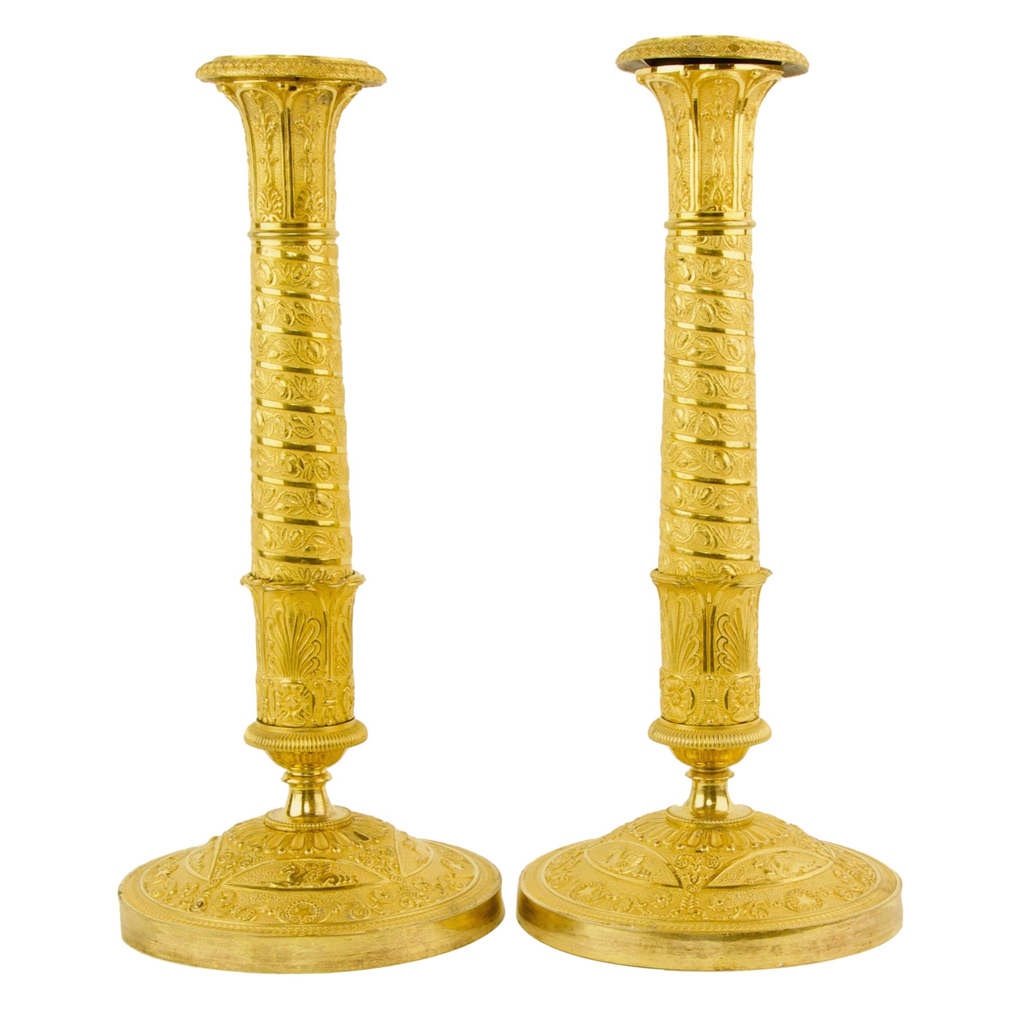 Pair of Early 19th Century Empire Trajan's Column Ormolu Candlesticks