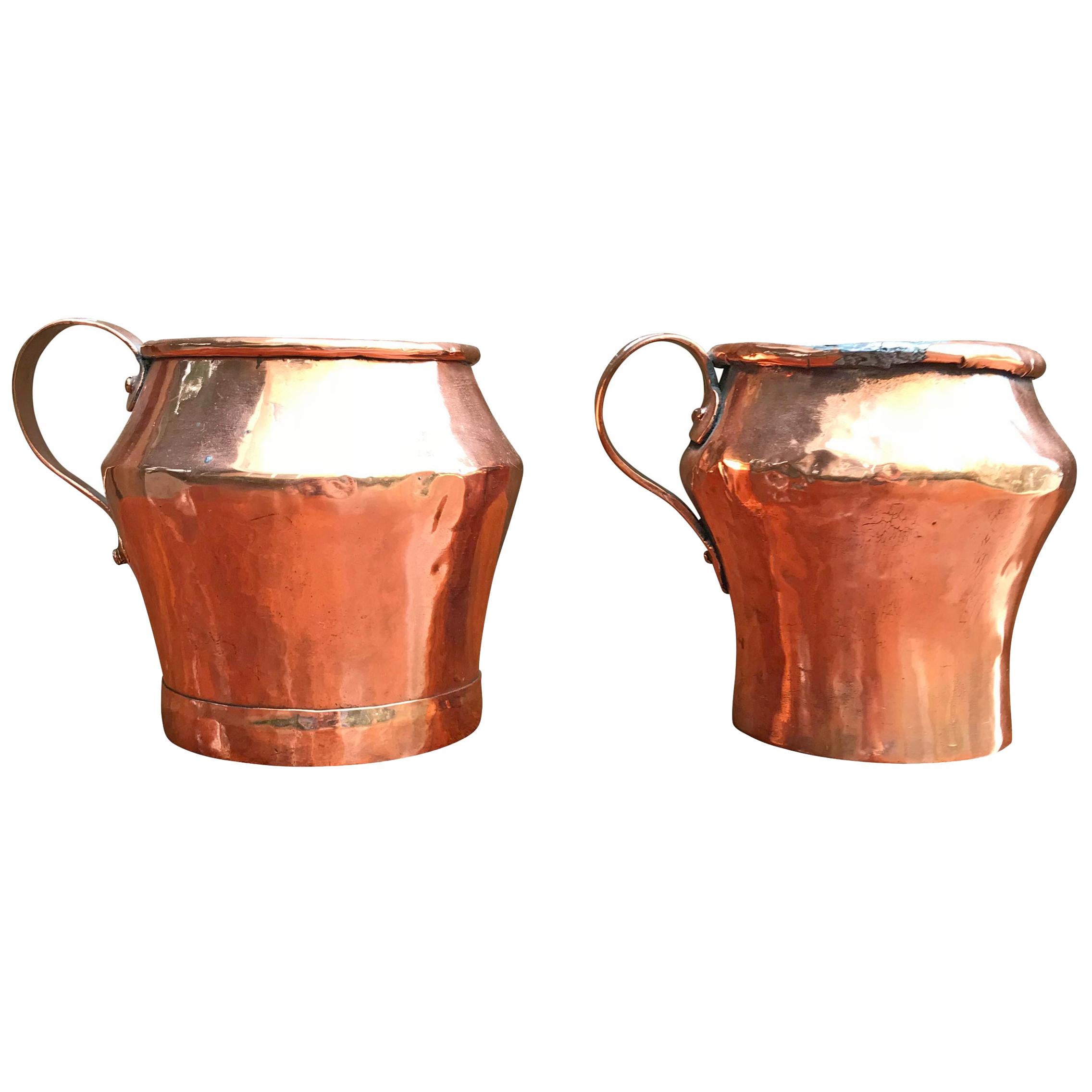 Pair of Early 19th Century English Copper Pitchers