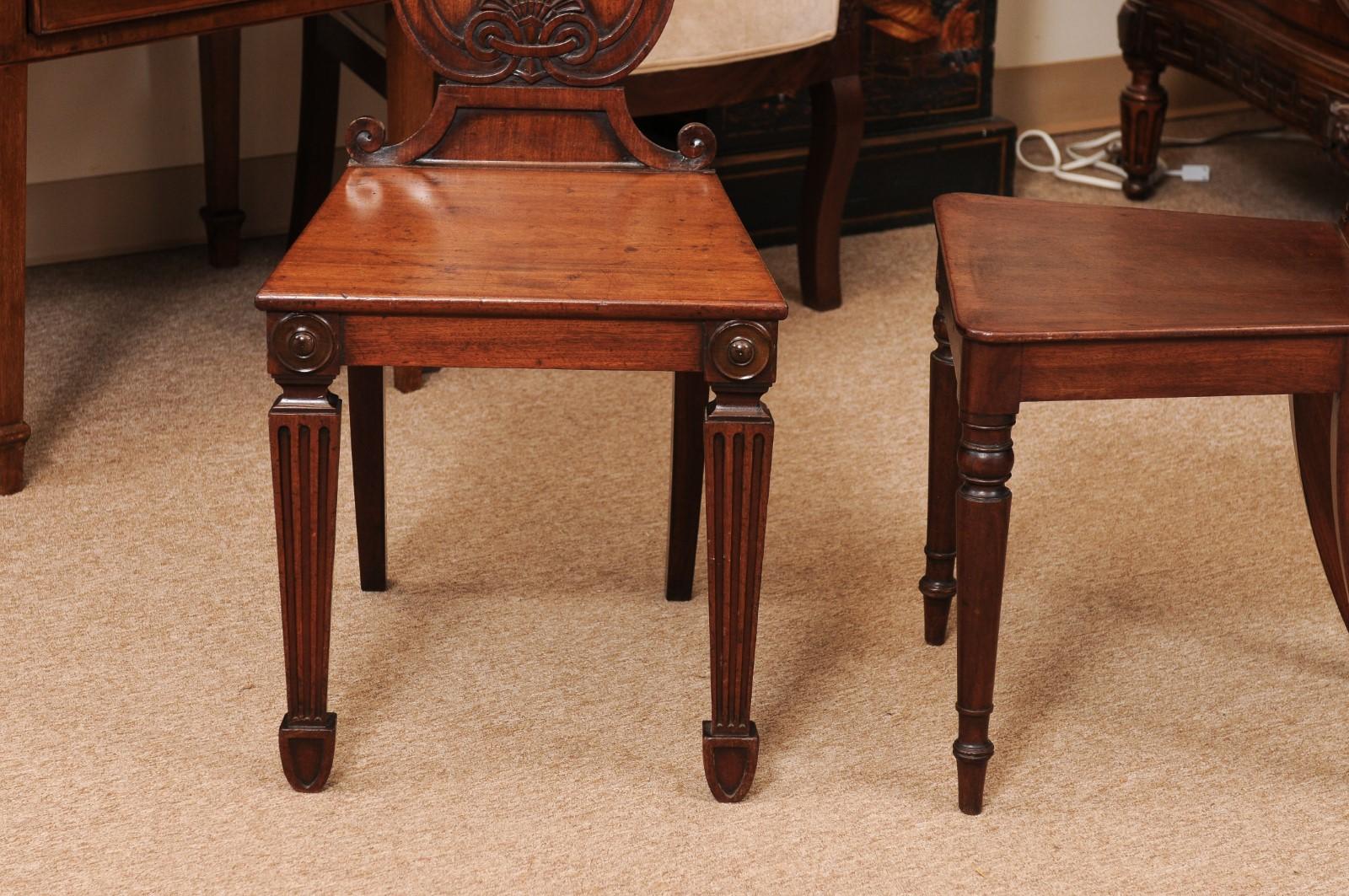 Pair of Early 19th Century English Mahogany Hall Chairs with Black Painted Crest For Sale 7