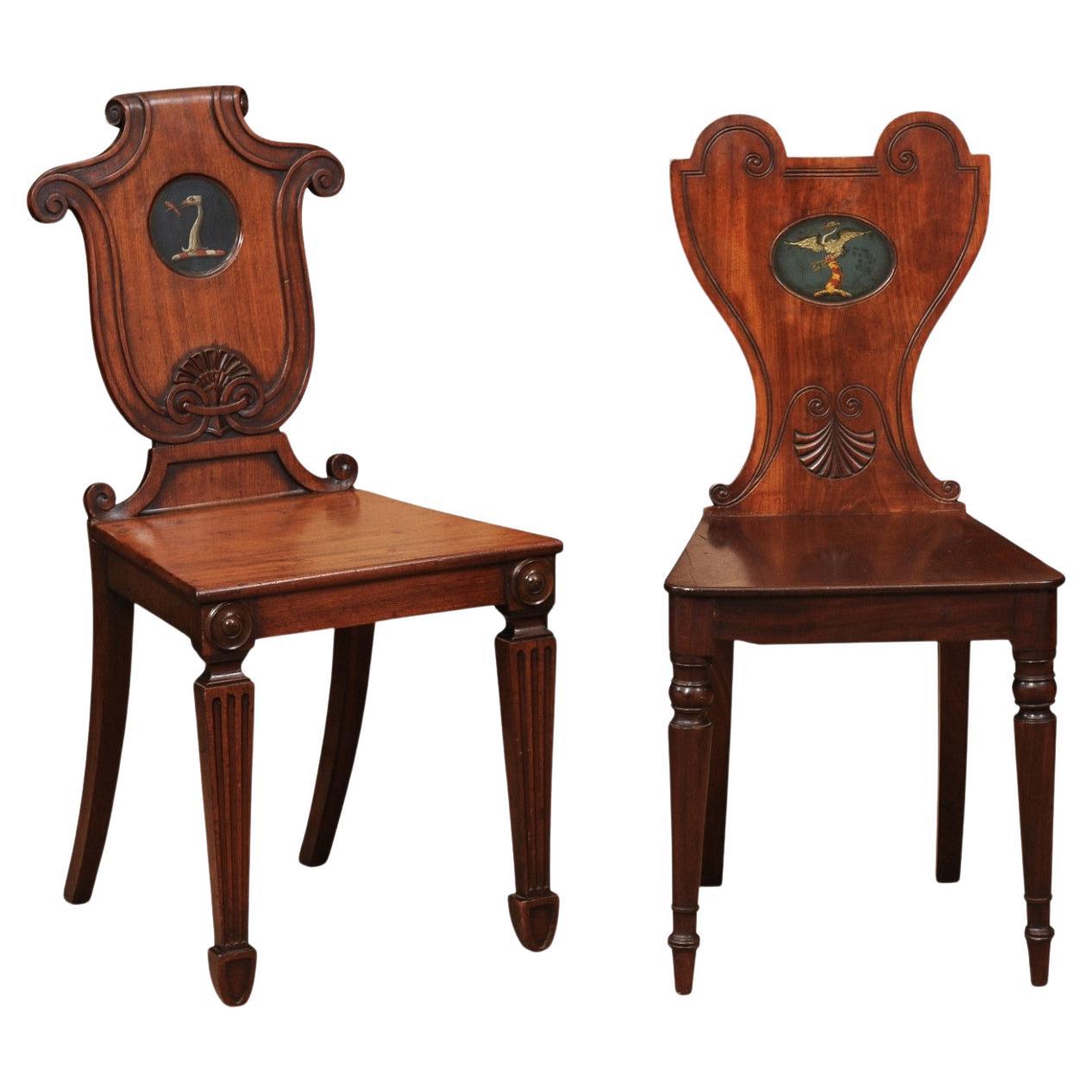 Pair of Early 19th Century English Mahogany Hall Chairs with Black Painted Crest For Sale