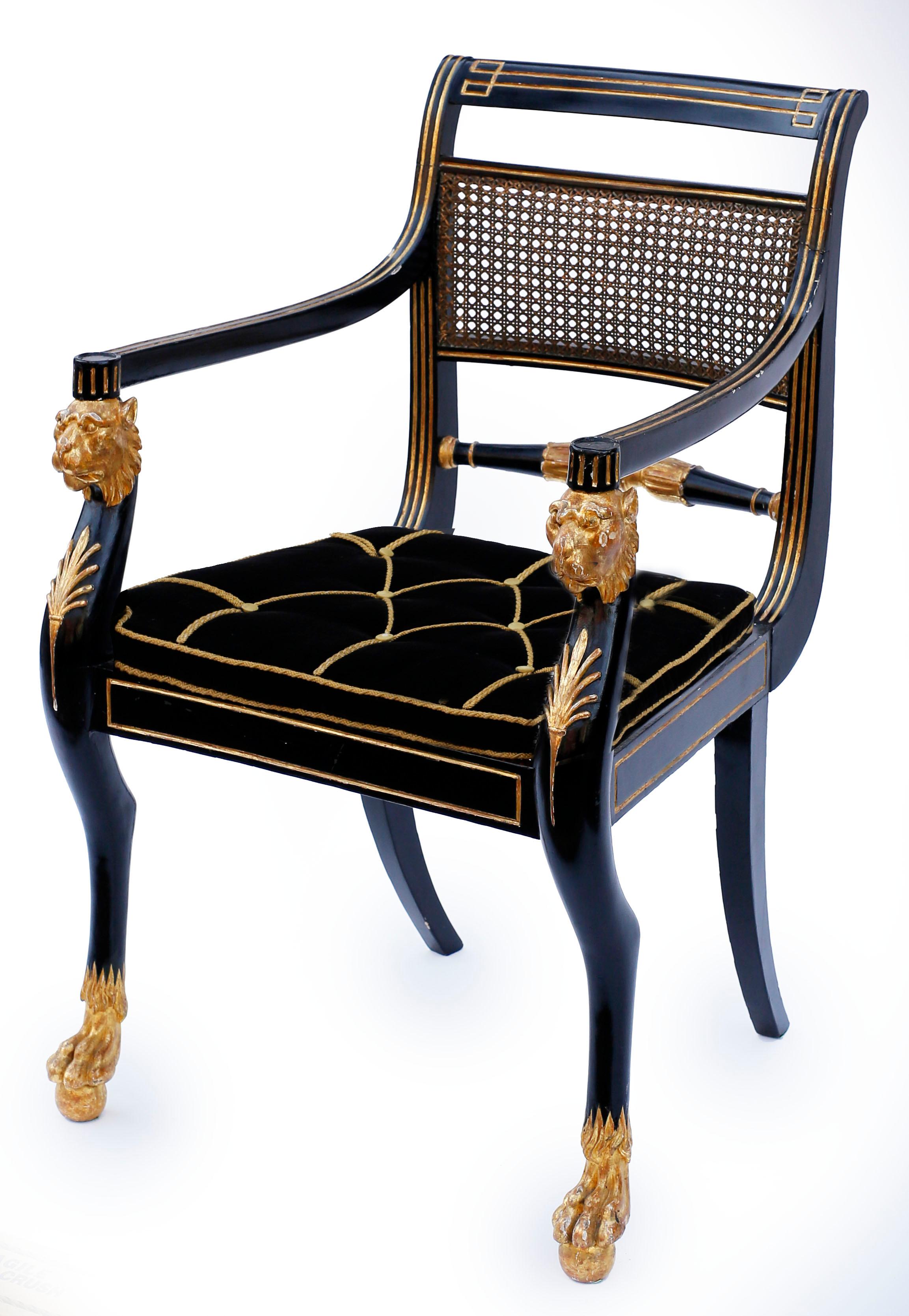 A stunning set of neoclassical ebonized and giltwood chairs attributed firmly to Gillows of Lancaster and London and inspired by the forms of Regency designer George Smith. These chairs are identical to a set supplied by Gillows to Colonel Hugh