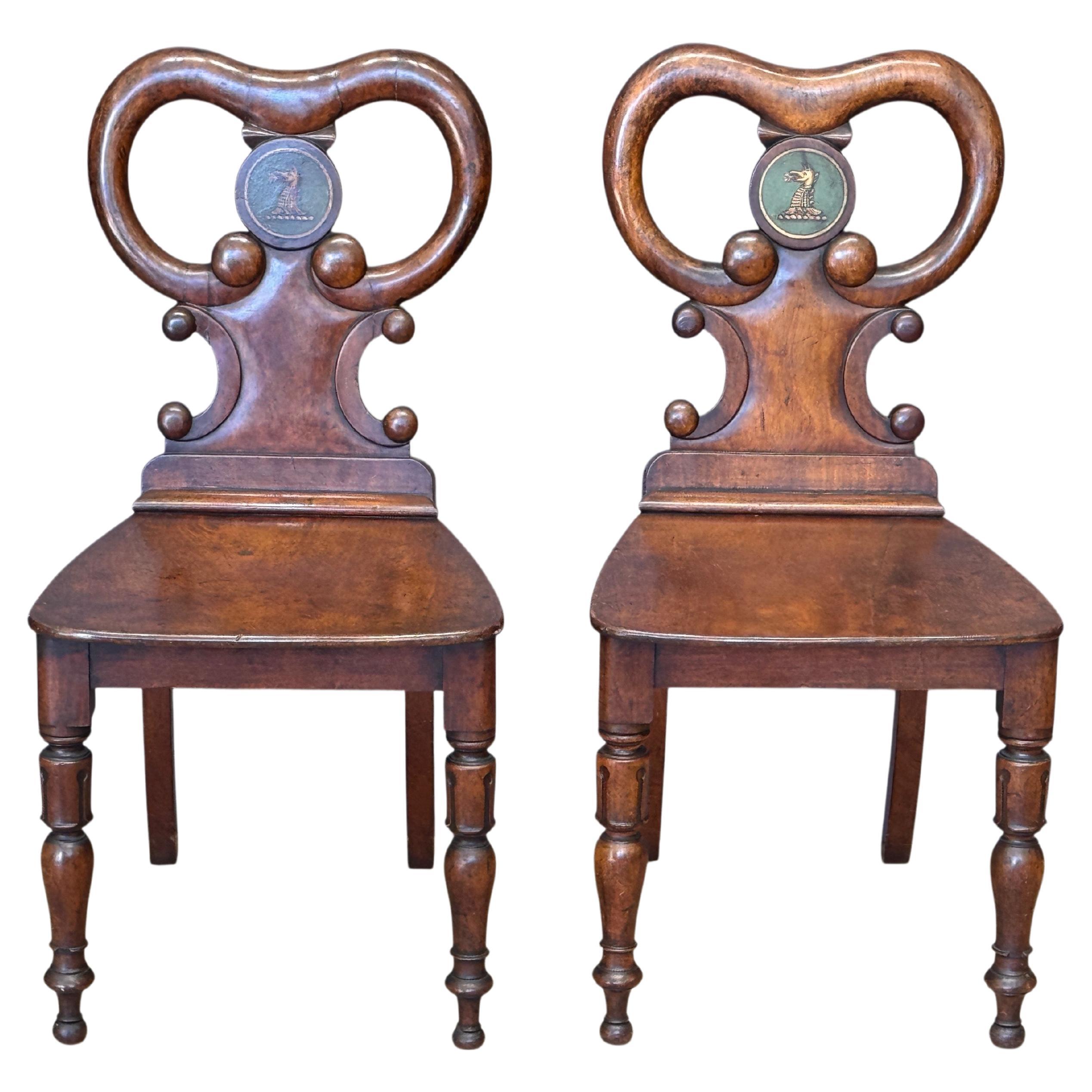 Pair of Early 19th Century English Regency Mahogany Hall Chairs For Sale