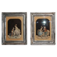 Pair of Early 19th Century French Cut-Out Passe-Partouts on Older Silvered Frame