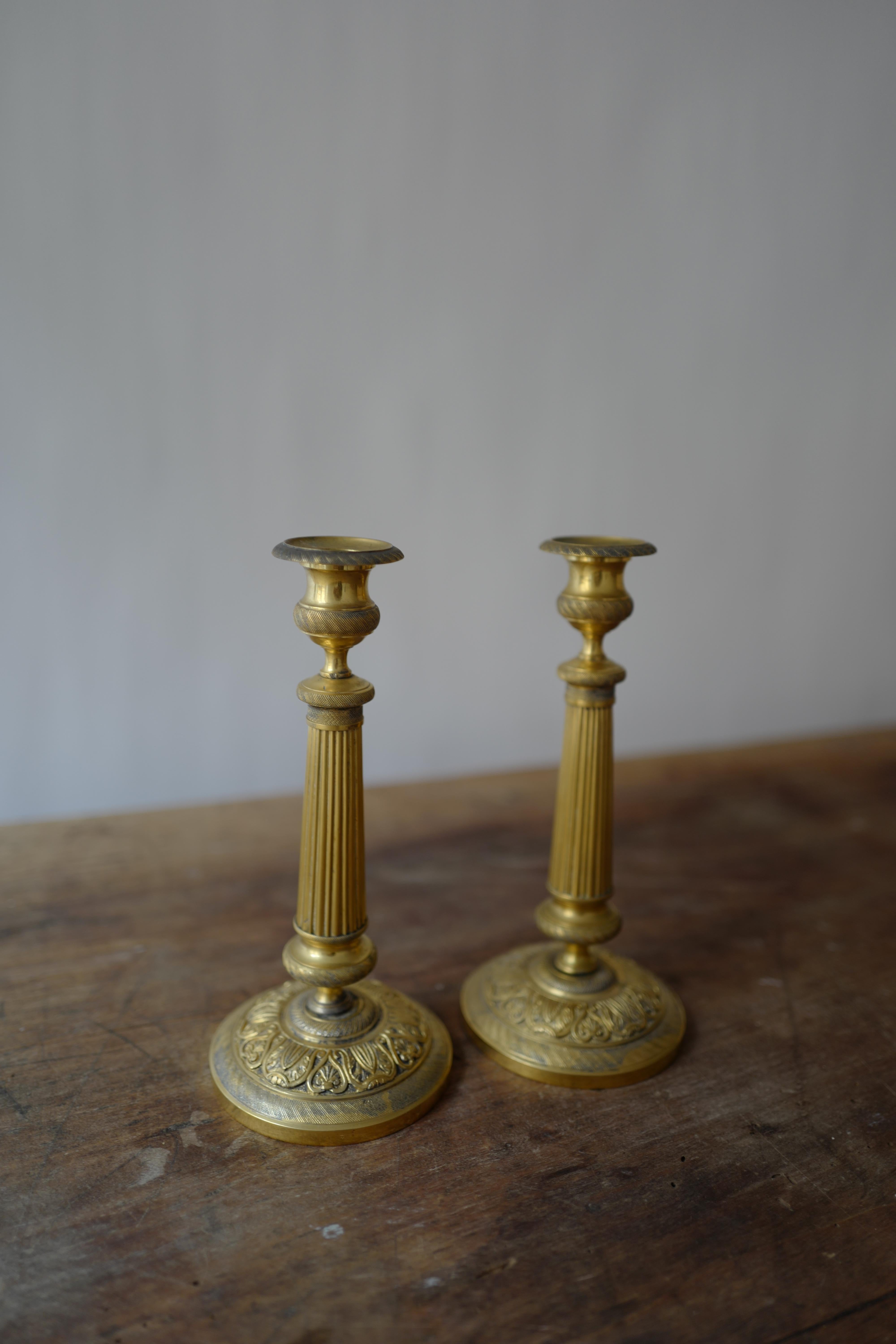 Gilt Pair of Early 19th Century French Empire Bronze Candlesticks For Sale