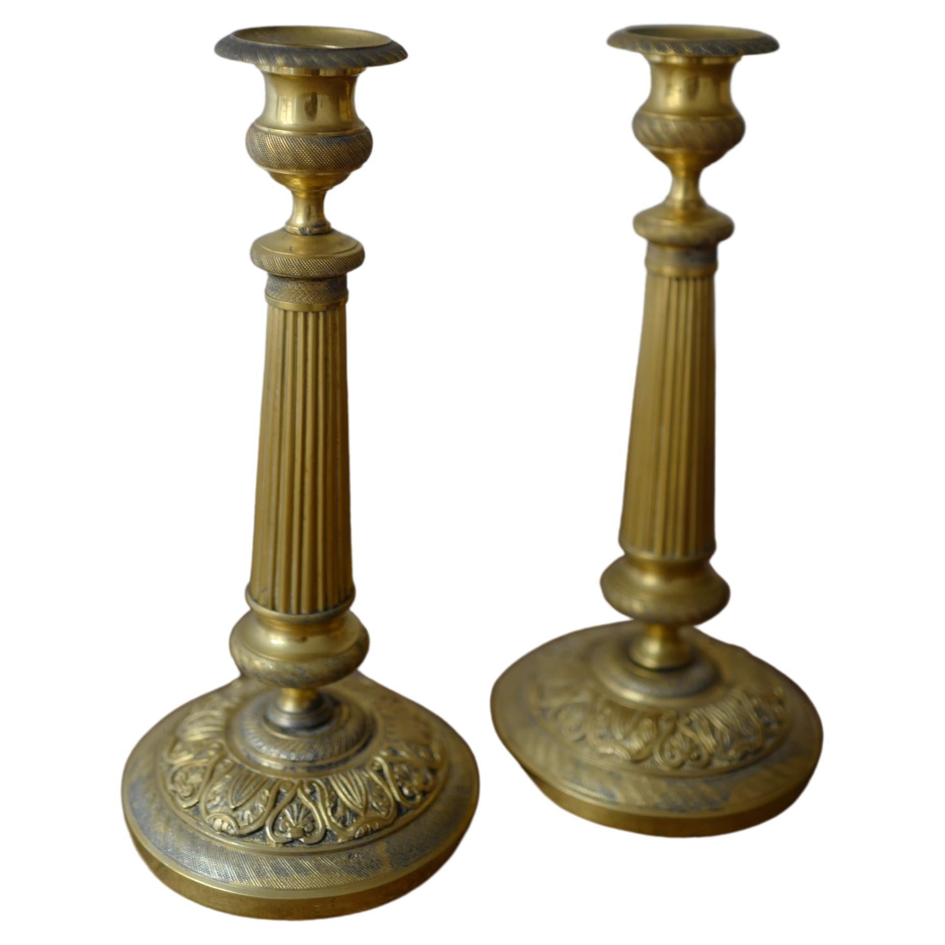 Pair of Early 19th Century French Empire Bronze Candlesticks