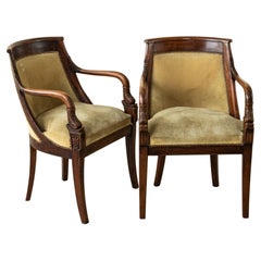 Pair of Early 19th Century French Empire Period Hand Carved Mahogany Armchairs