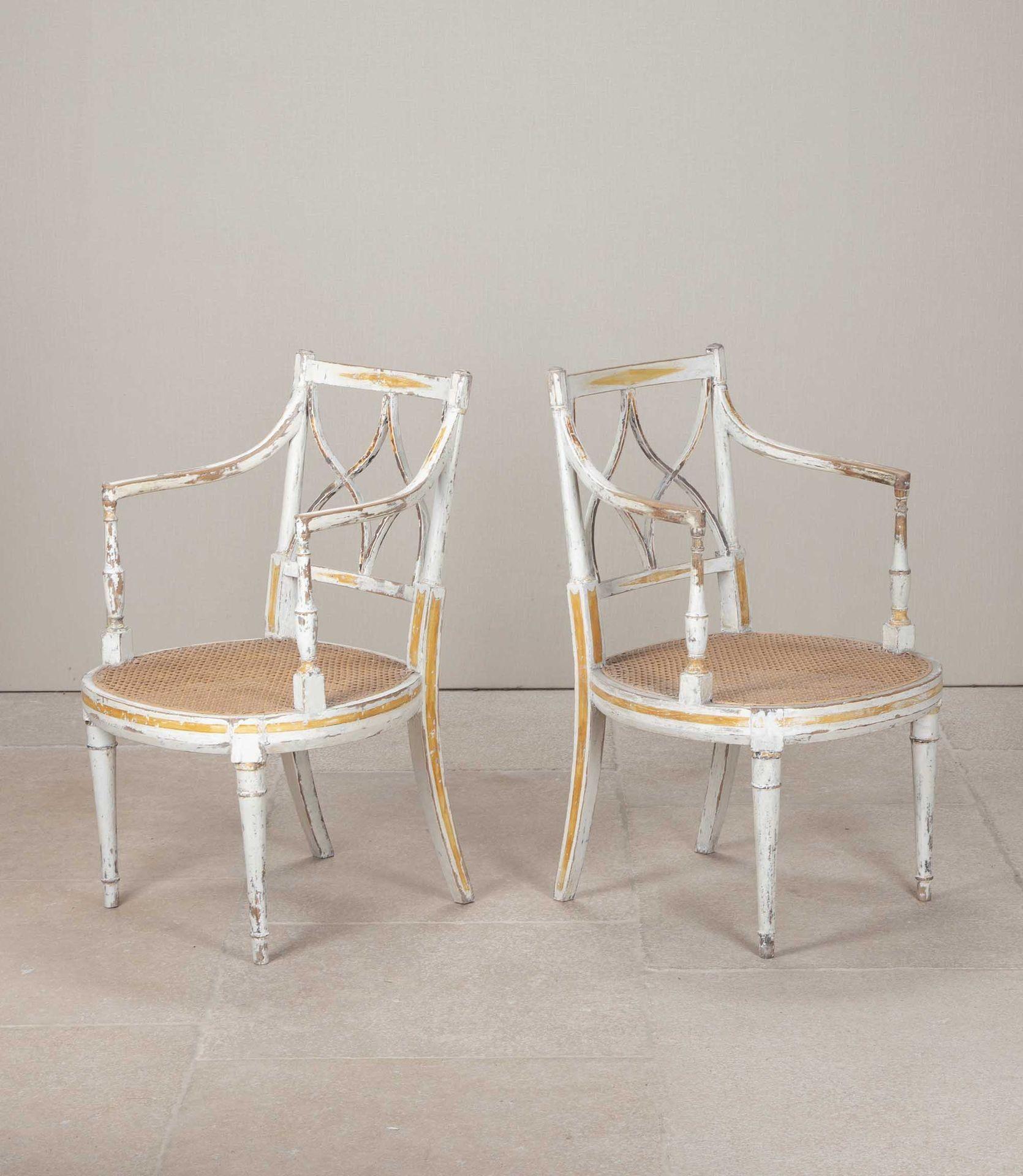 A wonderfully decorative, fine pair of George III, early 19th Century armchairs. Both in very good condition, stripped back to their glorious original white paint with gilt decoration.