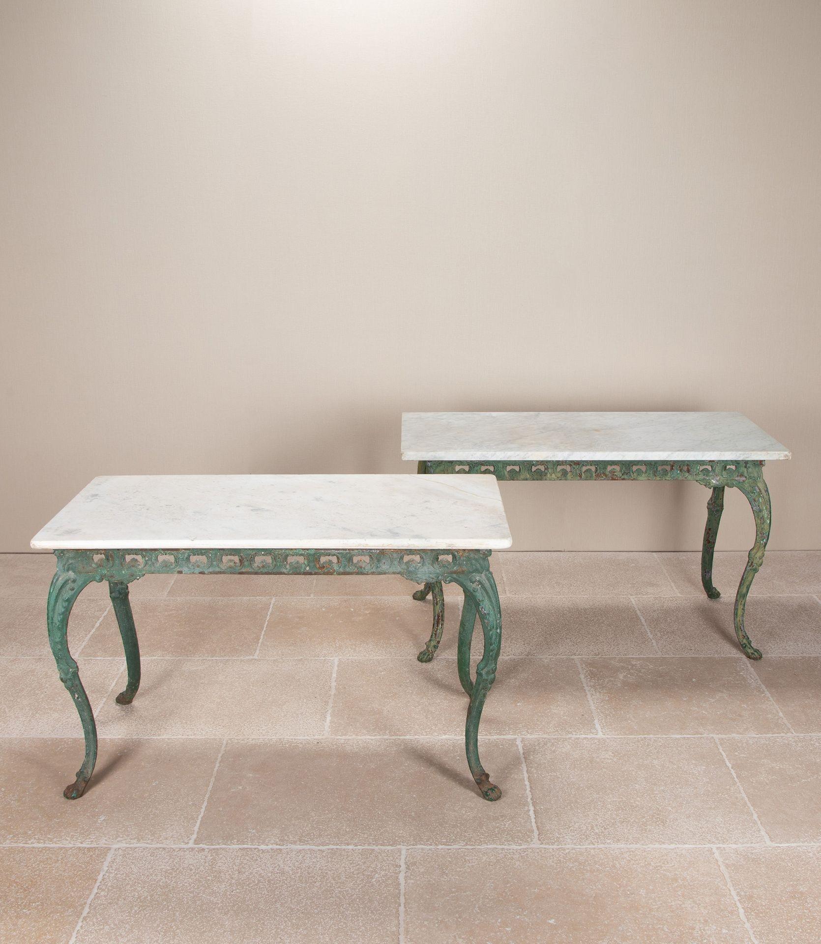 Pair of Early 19th Century Italian cast iron tables with Carrara marble tops.
Would be wonderful for a conservatory in a palazzo. 