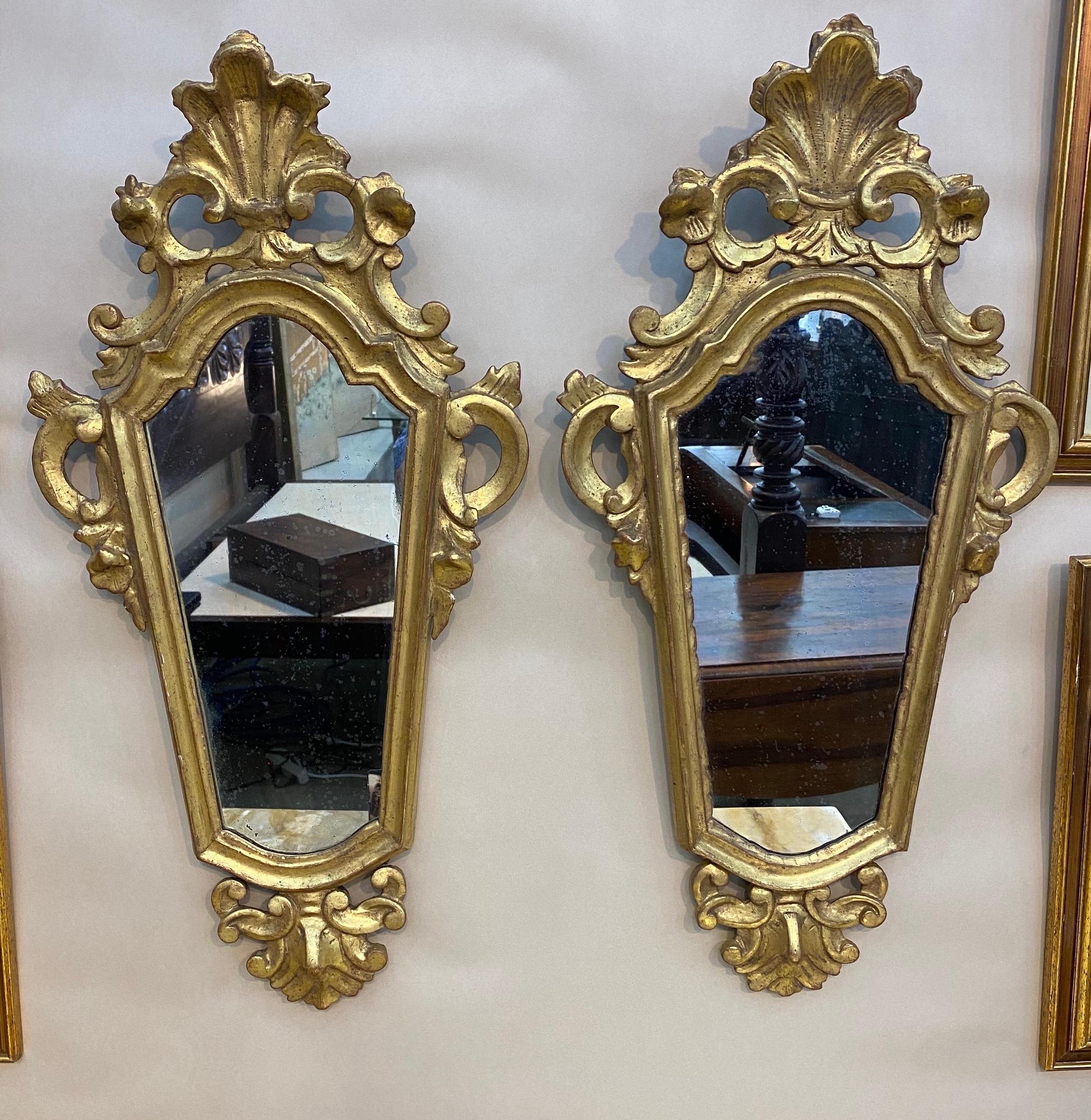 Pair of early 19th century Italian giltwood mirrors.