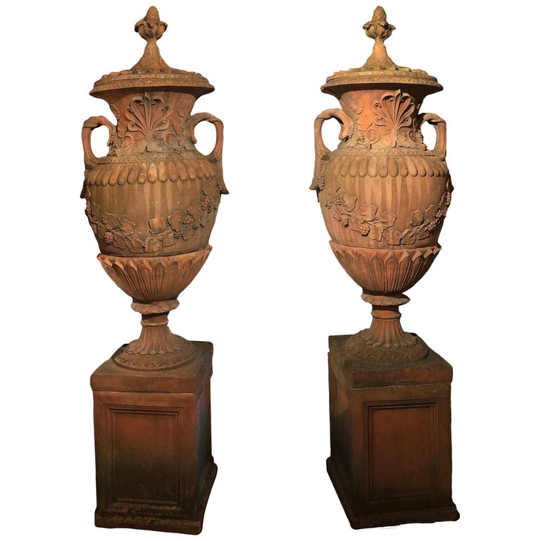 Pair of Early 19th Century Neoclassical Terracotta Urns and Lids on