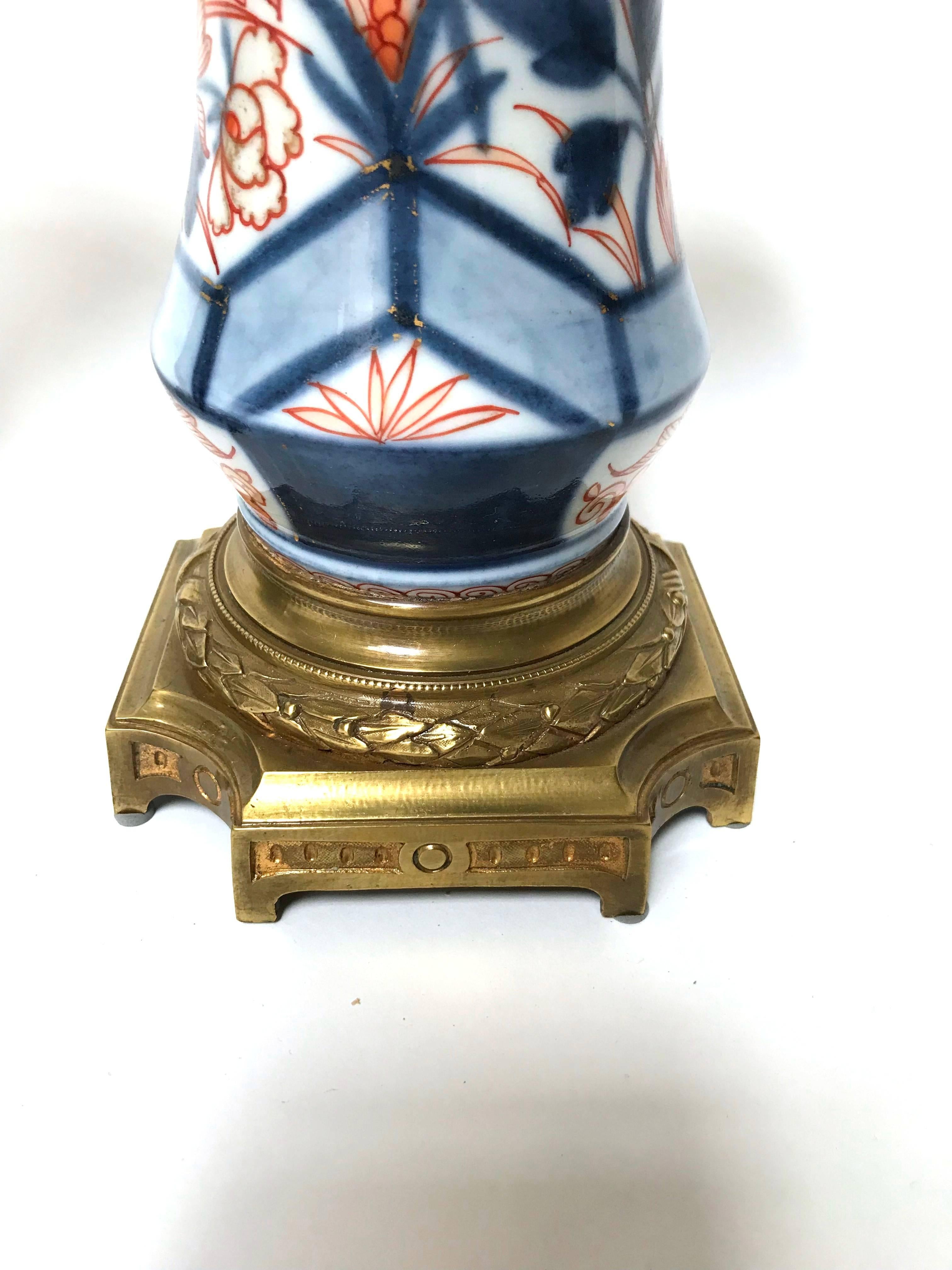 Pair of Early 19th Century Ormolu Mounted Japanese Imari Porcelain Vases In Good Condition For Sale In Dallas, TX