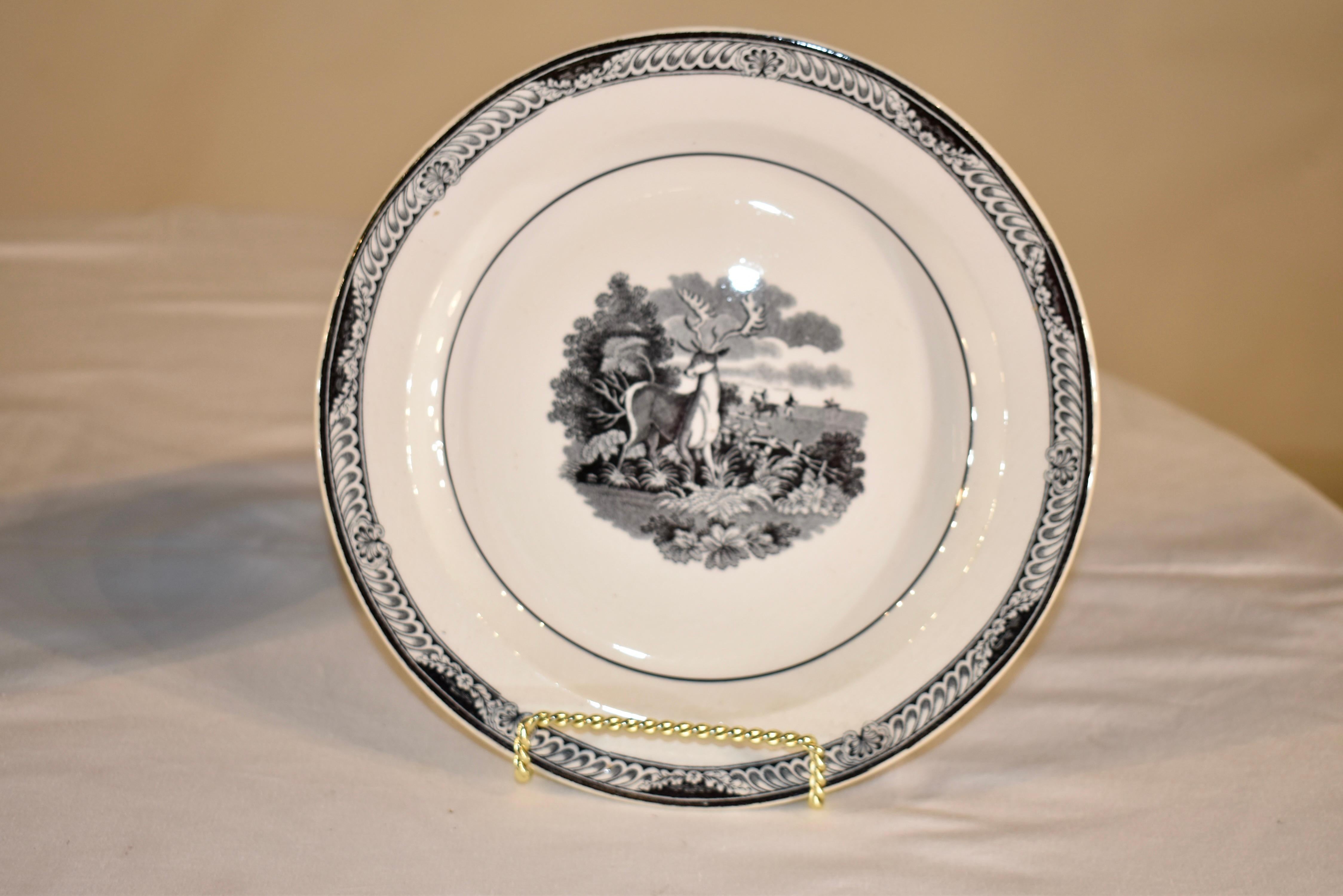 Pair of early 19th century plates by John Dawson & Co., Sunderland, Durham. The impressed mark dates from 1799-1837. These plates have lovely transfer in black of a hunting scene in the background and a single fallow deer in the foreground. This