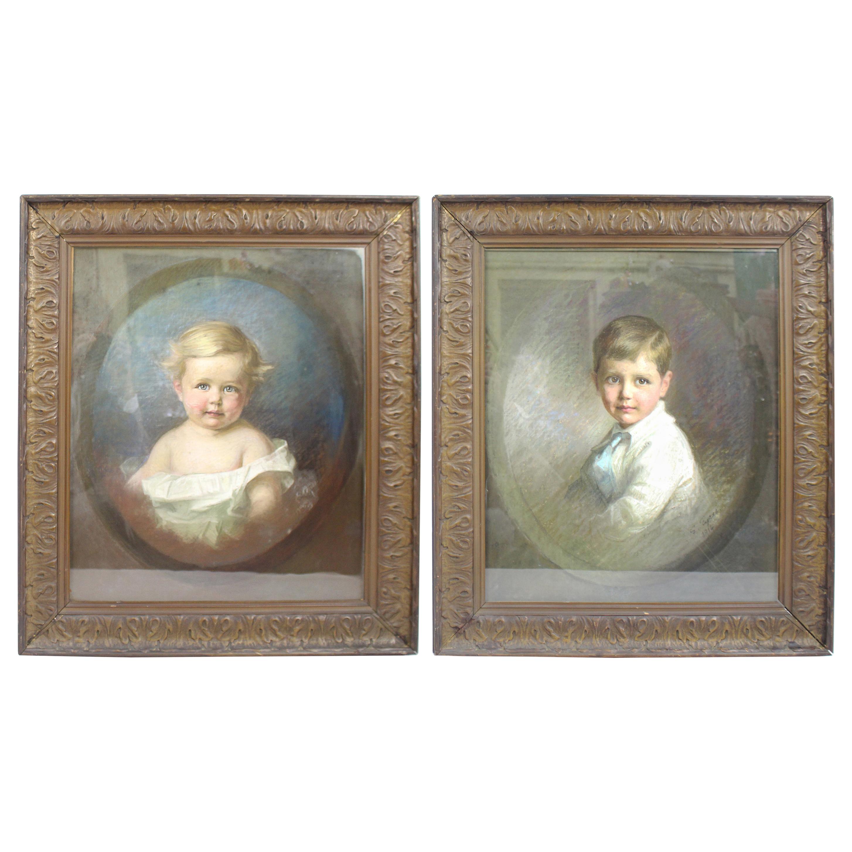 Pair of Early 20th c. Emily Eyres (British) Pastel Portraits of Children For Sale
