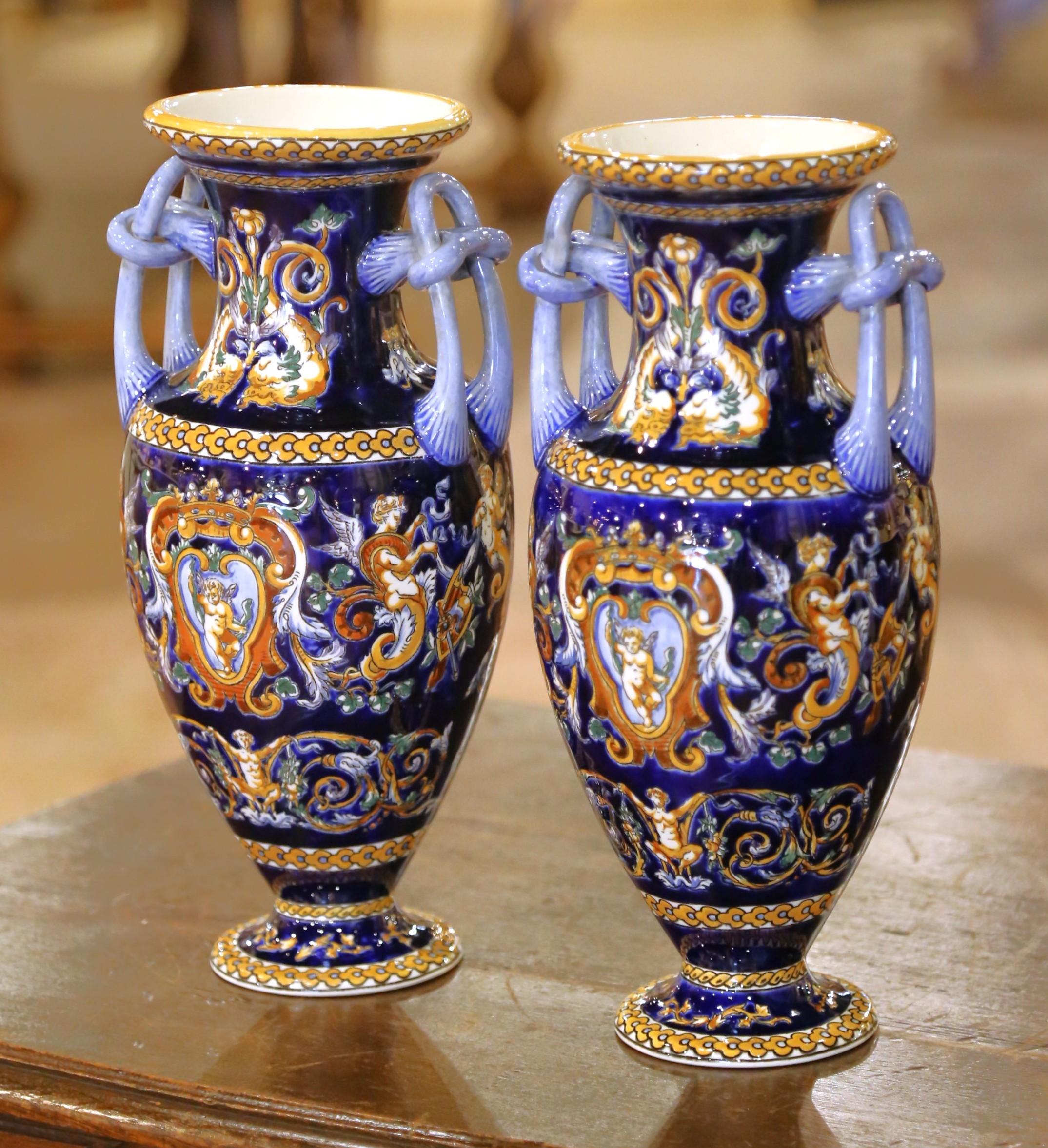 French Pair of Early 20th C. Faience Vases with Hand-Painted Cherub Motifs from Gien For Sale