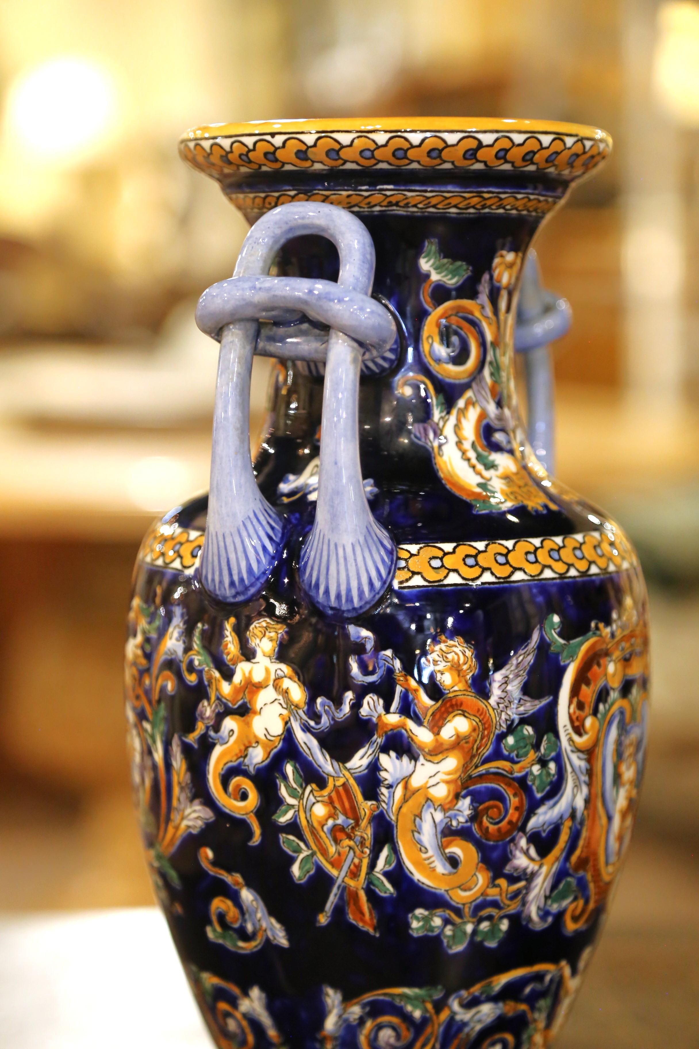 Hand-Crafted Pair of Early 20th C. Faience Vases with Hand-Painted Cherub Motifs from Gien For Sale