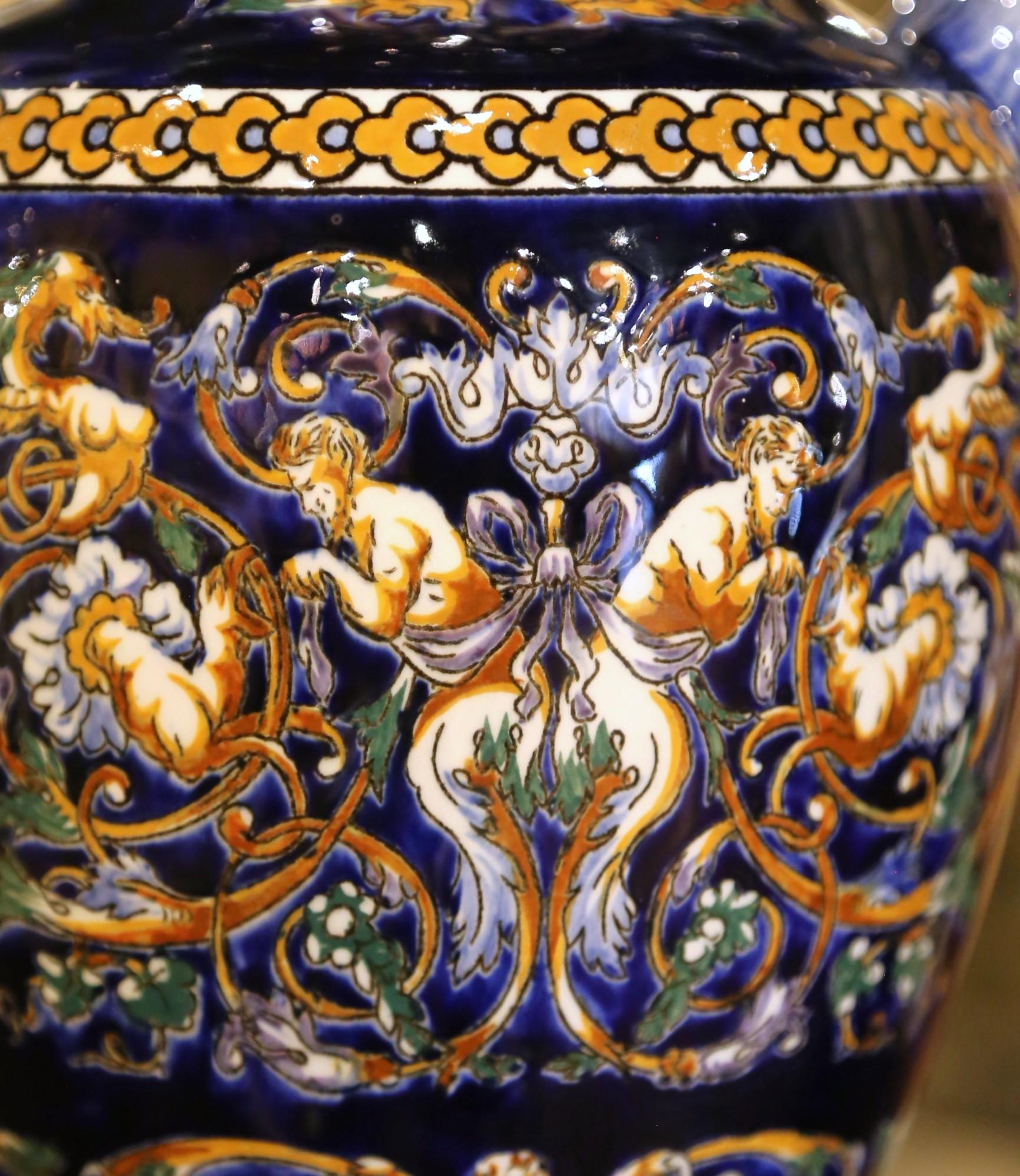 20th Century Pair of Early 20th C. Faience Vases with Hand-Painted Cherub Motifs from Gien For Sale